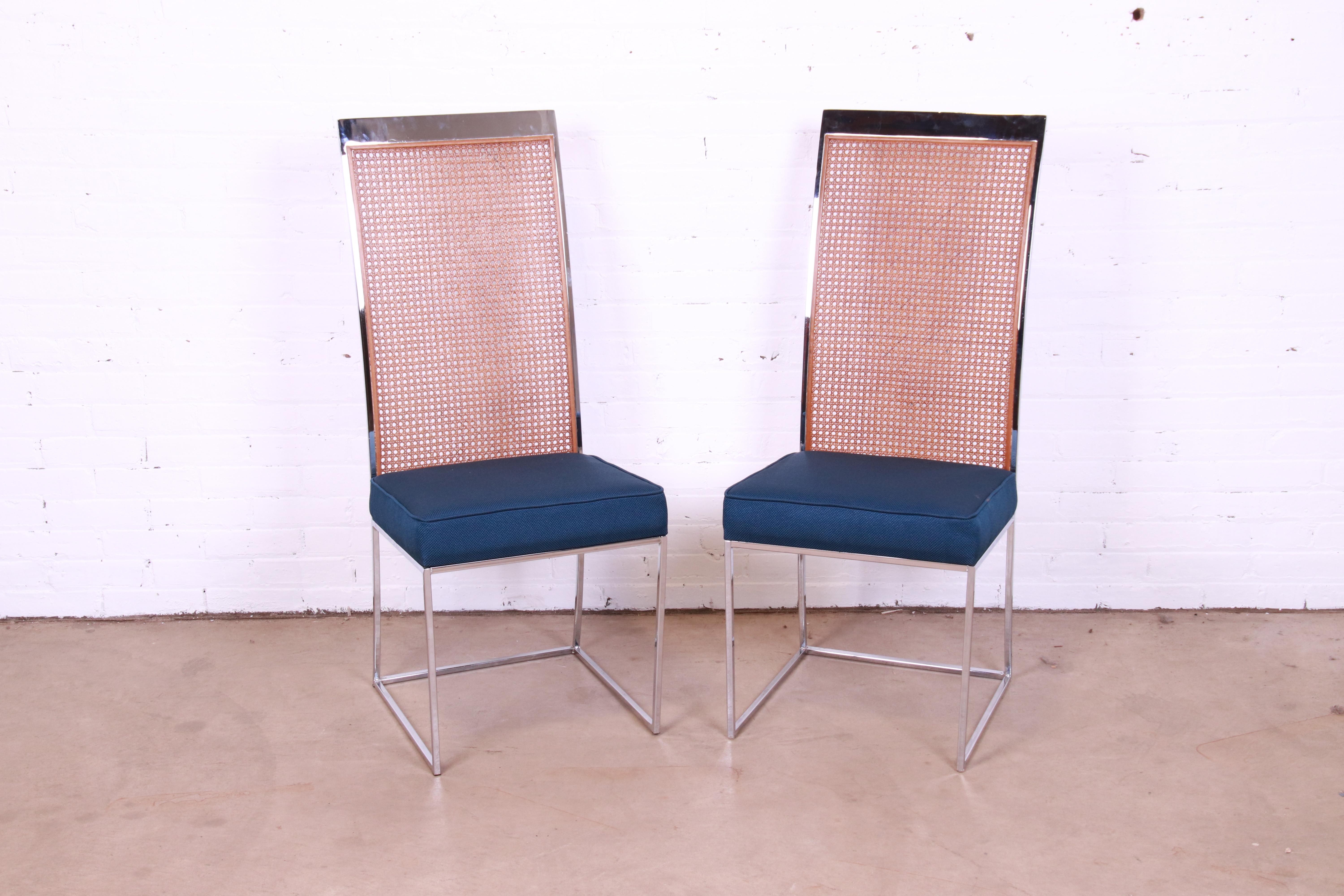 A rare and exceptional pair of mid-century modern high back dining chairs

By Milo Baughman for Thayer Coggin

USA, 1970s

Elegant minimalist chrome frames, with inset cane seat backs and upholstered seats and armrests.

Measures: 18.5