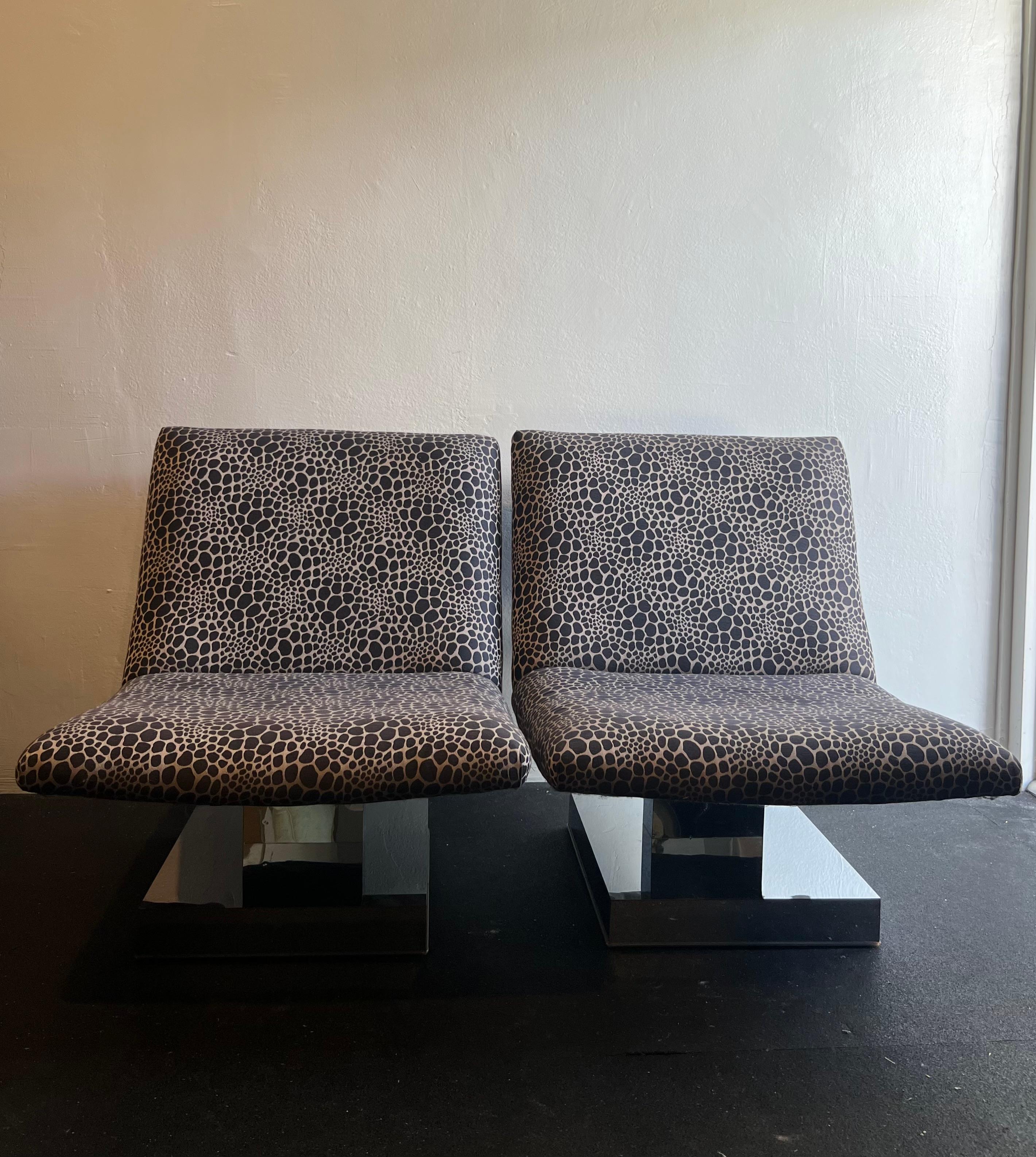 Pair of Milo Baughman for Thayer Coggin chrome lounge chairs. Oversized frames seat very comfortably. Chairs have been reupholstered within the last few years by the previous owners. Original order label in tact underneath one chair. Original rubber