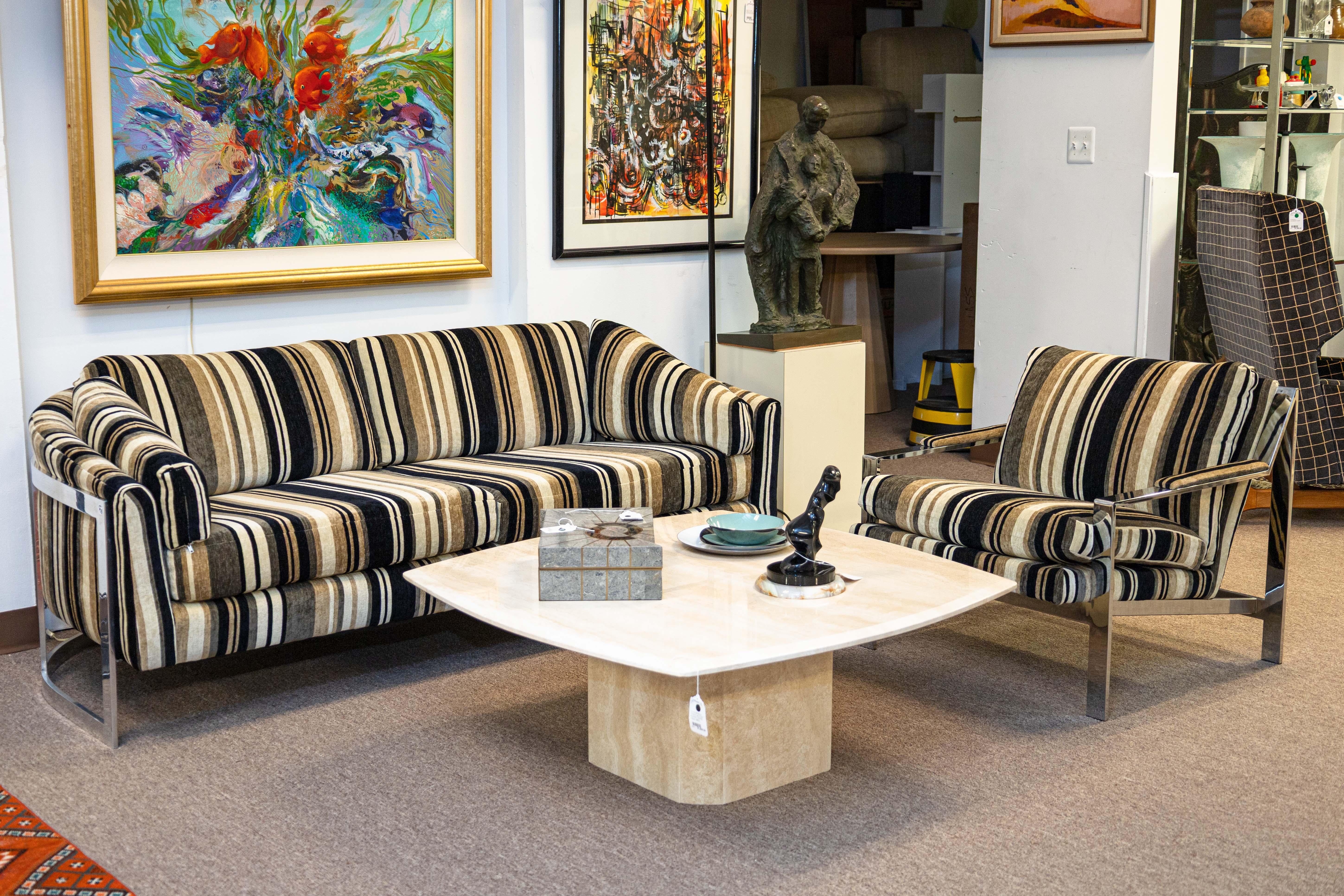 A Milo Baughman for Thayer Coggin flat bar chrome accent armchair with striped fabric upholstery. This lovely modern chair features a classic Baughman design with its use of flat bar chrome throughout the frame, a great juxtaposition to the chenille
