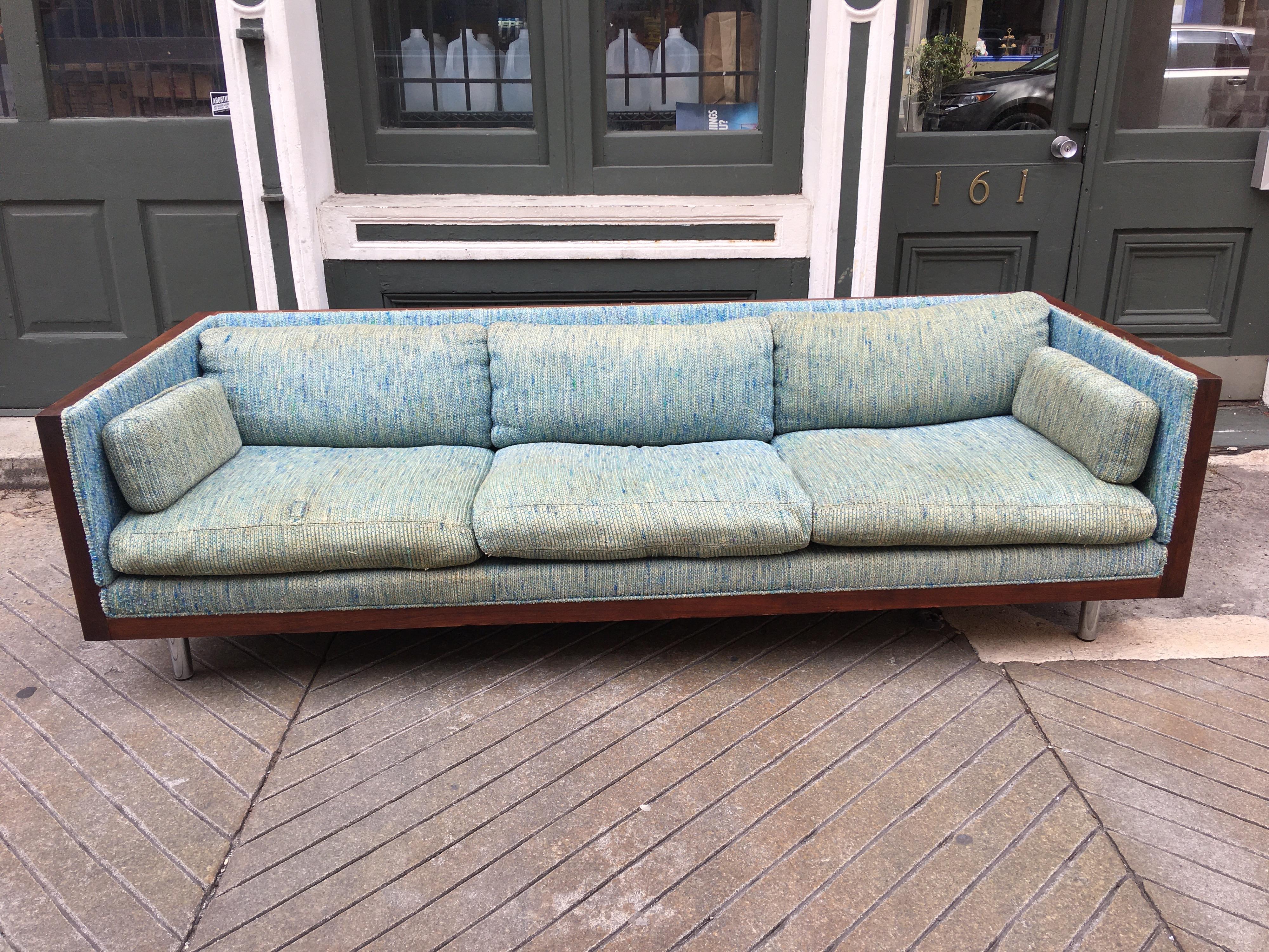 Walnut shell floating sofa by Charlton. Walnut shell sits up on 4 chrome round feet. You choose your fabric and we will do the rest! Price is for sofa redone in your fabric!