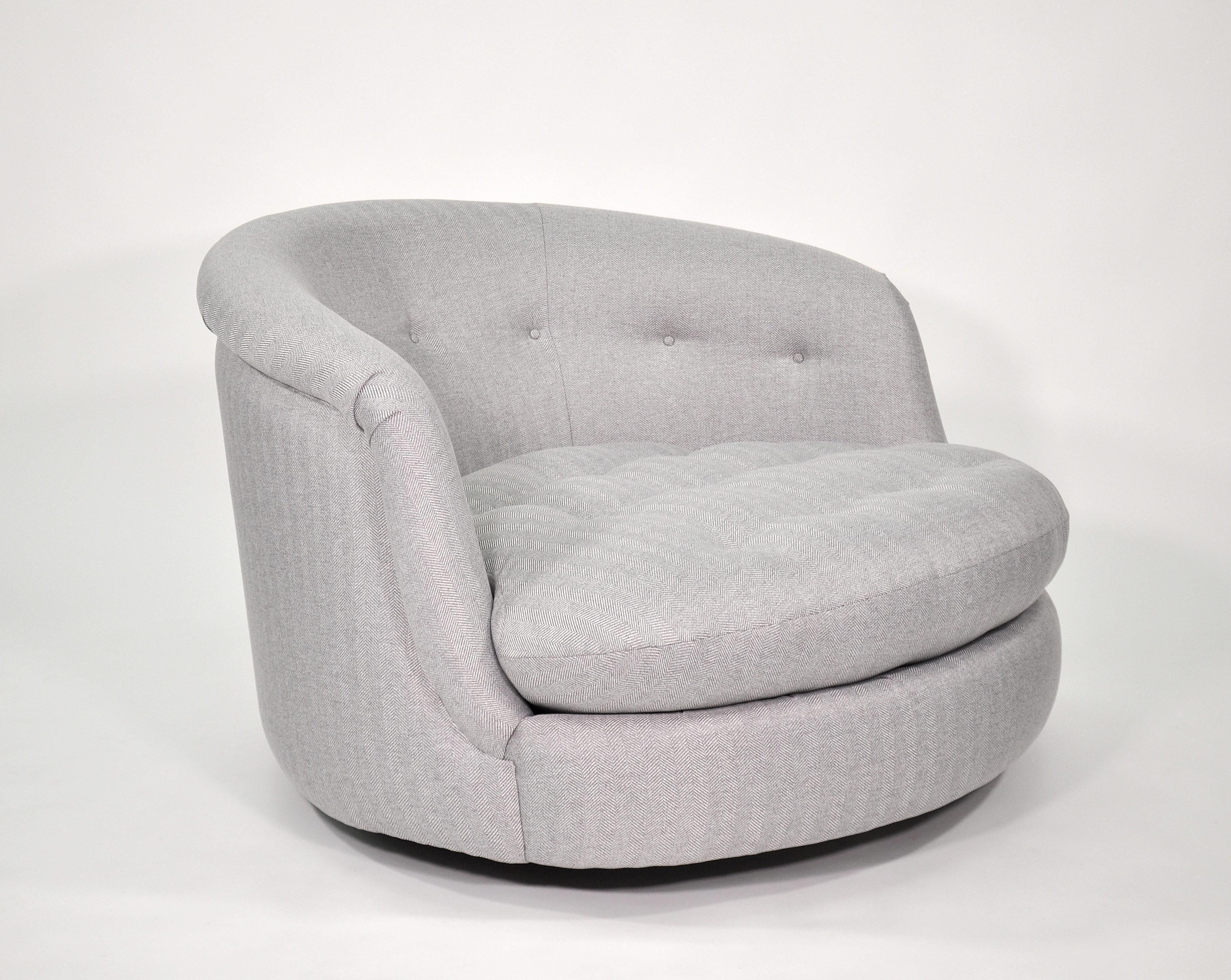 A fabulous Mid-Century Modern oversized barrel back gray tufted club chair, model 3405, designed by Milo Baughman for Thayer Coggin in 1965, and named the 