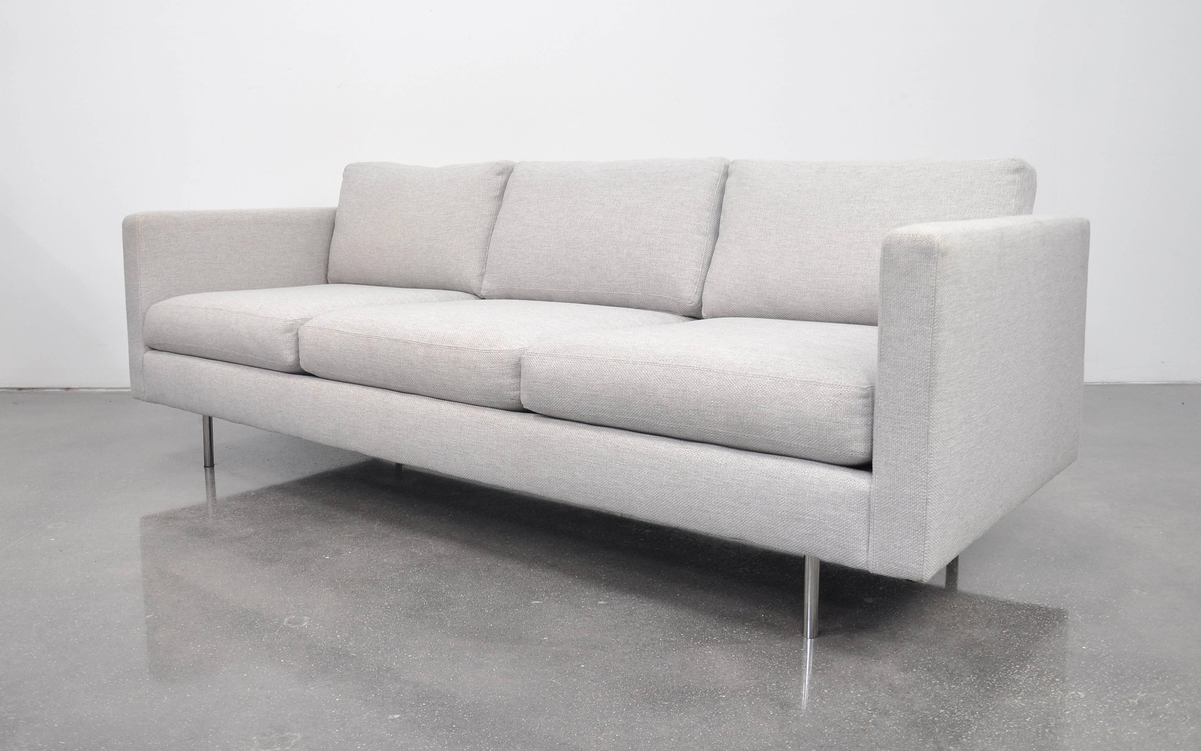 A vintage model 855-303 light grey couch with polished stainless steel tubular legs. Very comfortable, neutral and Classic, it works well with virtually any decor, from contemporary to traditional to Danish, French, Italian, Scandinavian or American