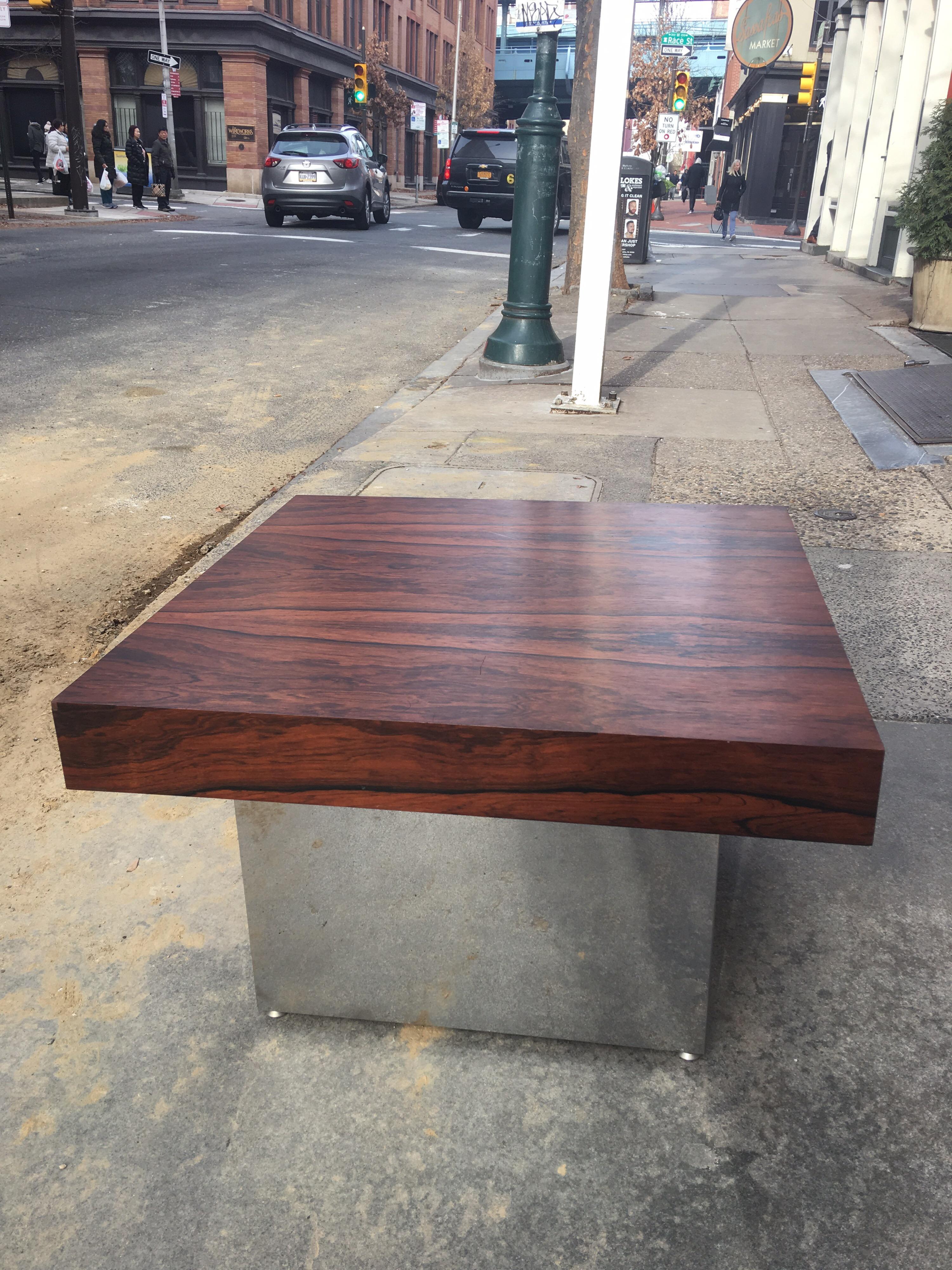 Beautiful rosewood table designed by Milo Baughman for Thayer Coggin Furniture. Can easily be used as a coffee or end Table. Rosewood is in great original condition and chrome base is very clean. Table measures 32
