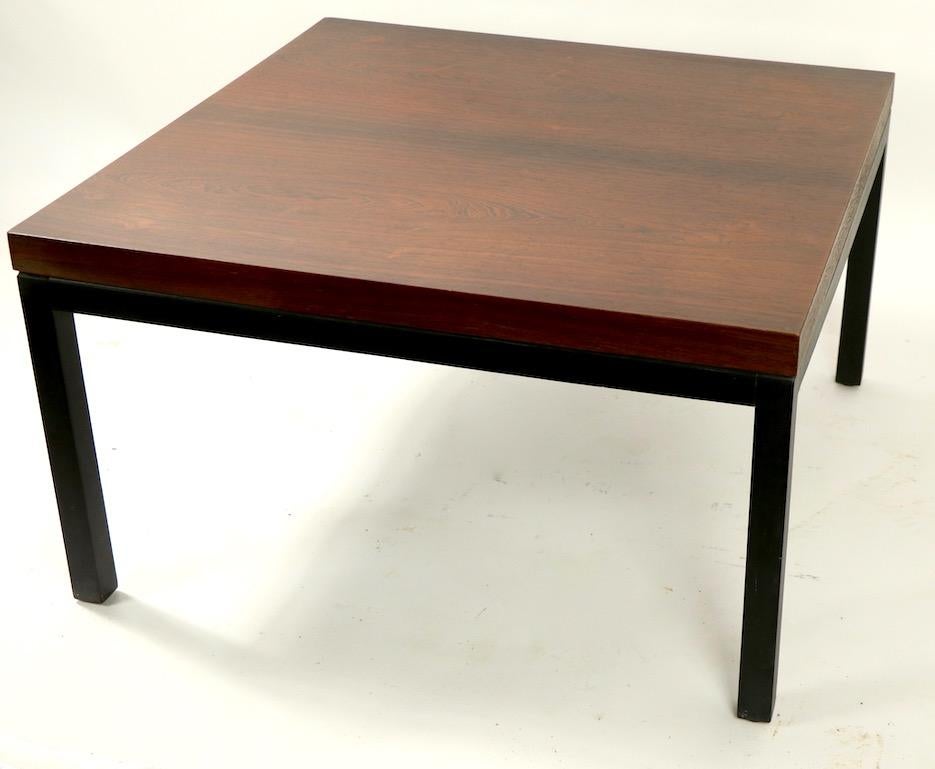 Classic Baughman for Thayer Coggin end, side, or occasional table with a rosewood veneer top on
squared ebonized leg base. This example is in very good, original condition showing only light cosmetic wear, normal and consistent with age, it retains