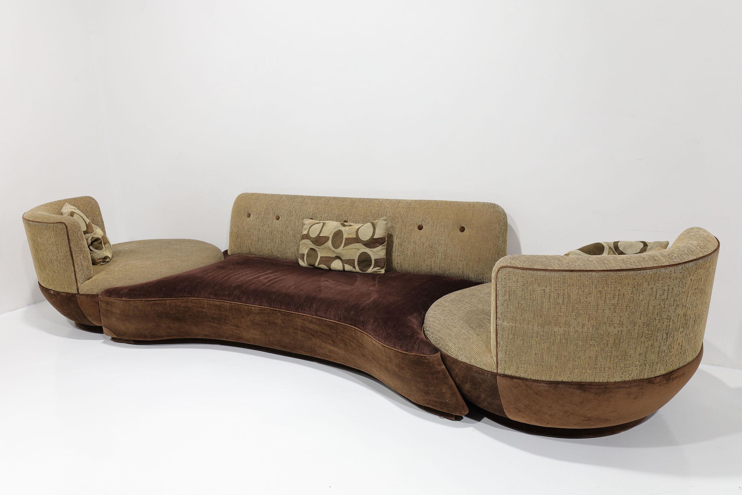 What a set! A curvy sofa with swivel chairs butted up to each side. The Milo Baughman for Thayer Coggin sofa is in original vintage condition, offering an authentic mid-century modern aesthetic for your home. We can help with reupholstery, but if