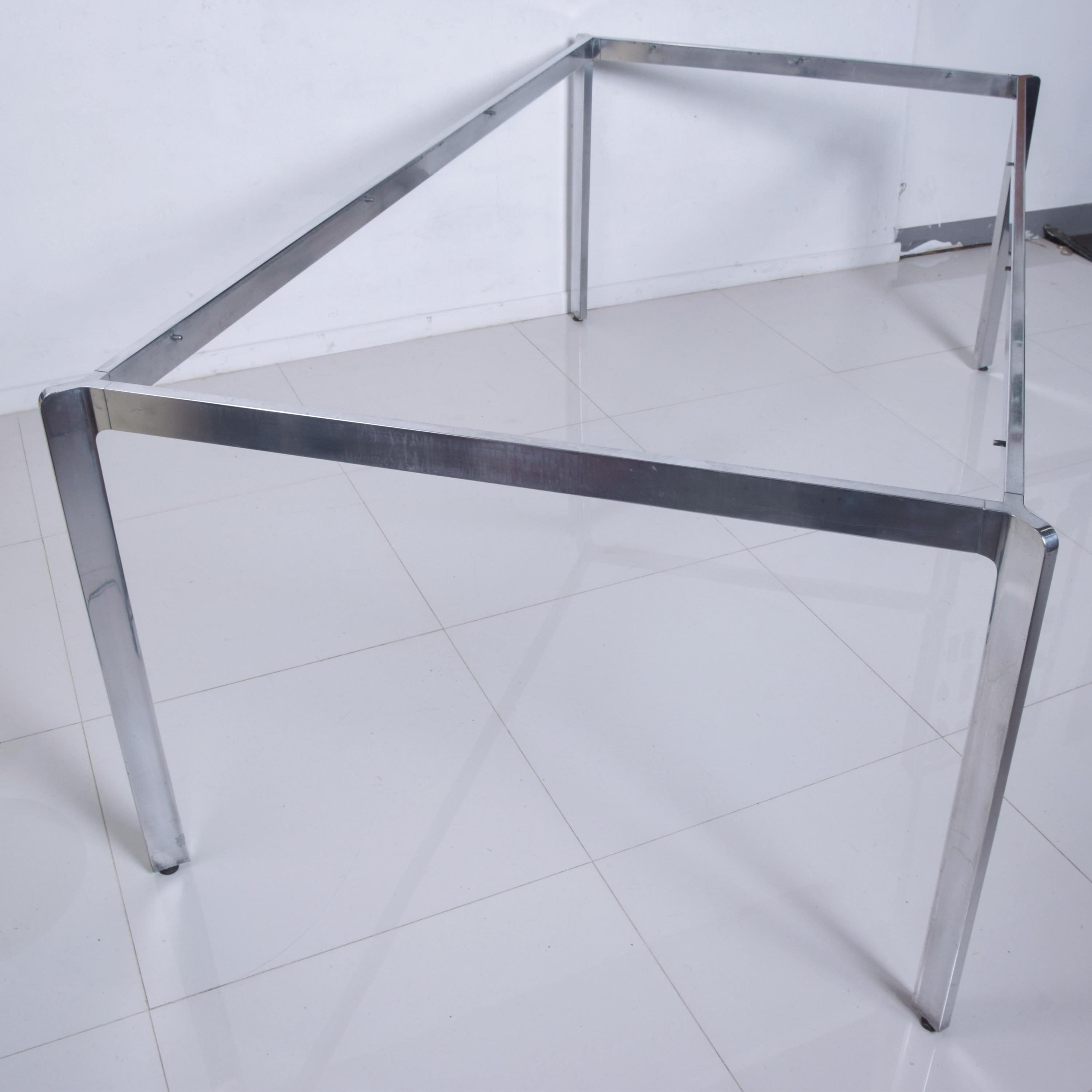 Dining Table
Milo Baughman French Glass Dining Table Angular Polished Aluminum Base Tempered Glass circa 1970
Unmarked
Measures: 42 x 80 x 28 1/2  Glass 37 3/4 x 75 3/4 x 1/4
Original Unrestored Vintage Preowned Condition. Tempered glass shows