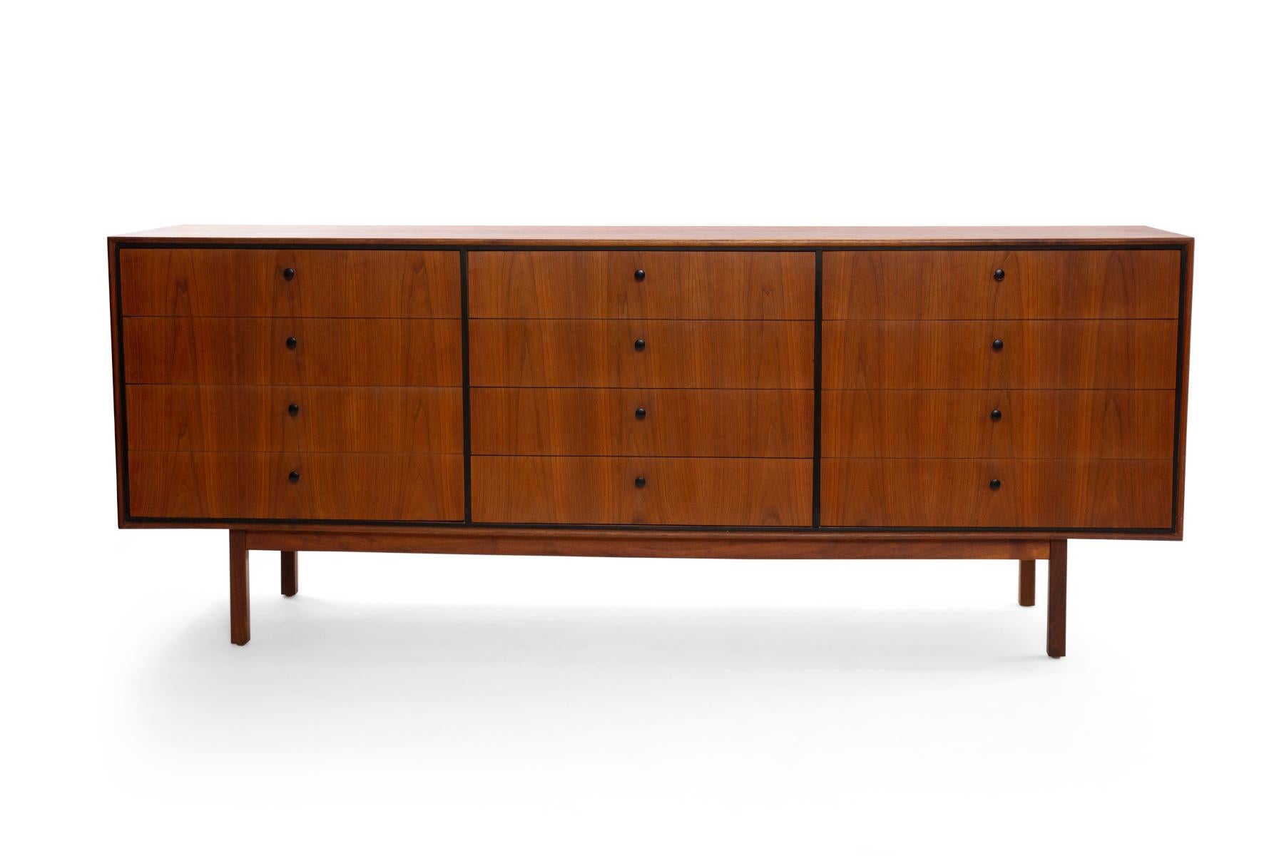 Milo Baughman for Glenn of California 12 drawer dresser circa mid-1960s. This example has incredible graining to the walnut case and drawer fronts, sculpted drawer pulls and lots of storage.