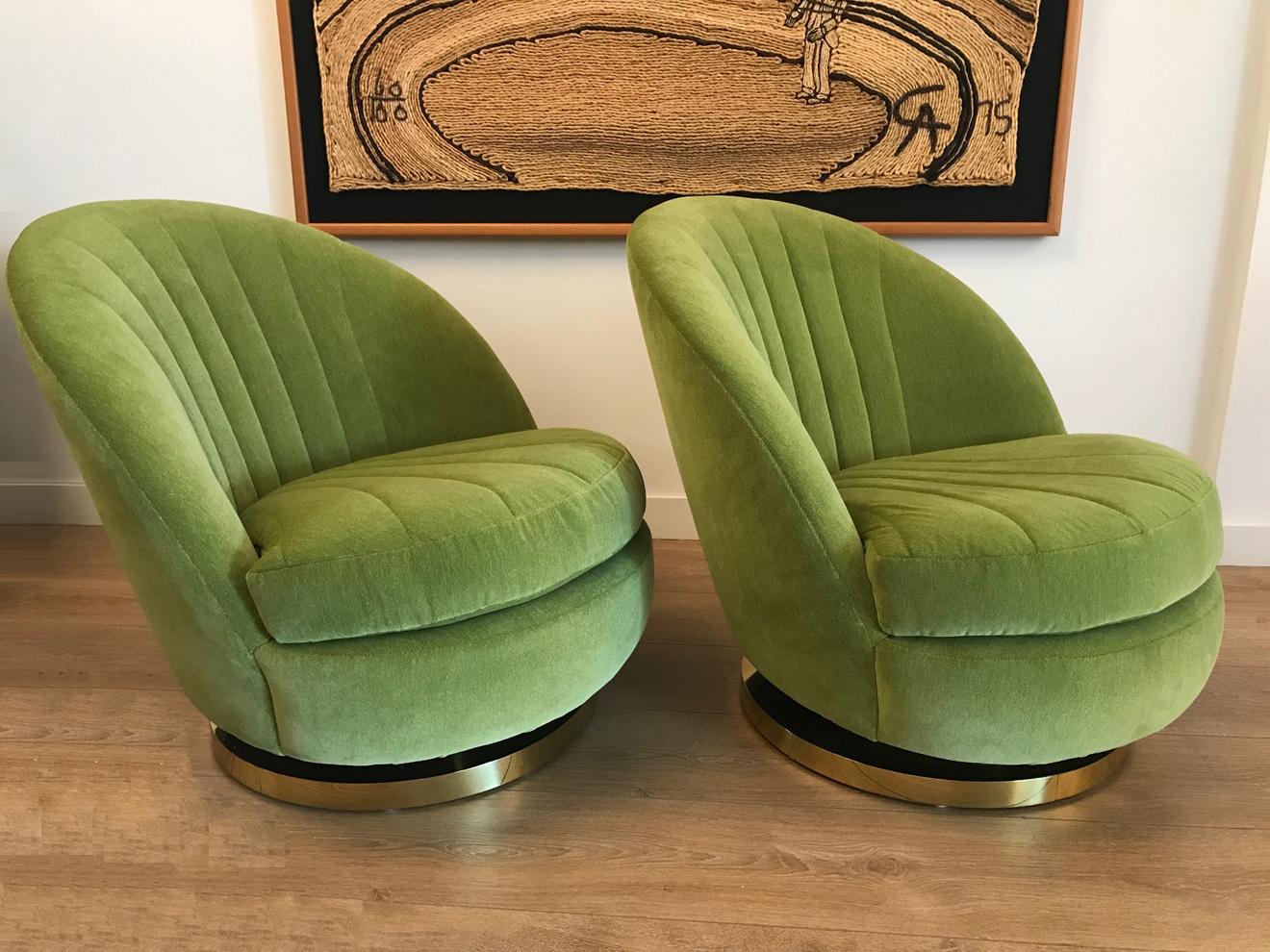 Pair of Milo Baughman green chartreuse (velvet/mohair) swivel and tilt lounge chairs with circular brass base. Excellent proportions.  Newly restored to perfection.
USA, 1970s.
FREE SHIPPING, White Glove to Continental US.
 
