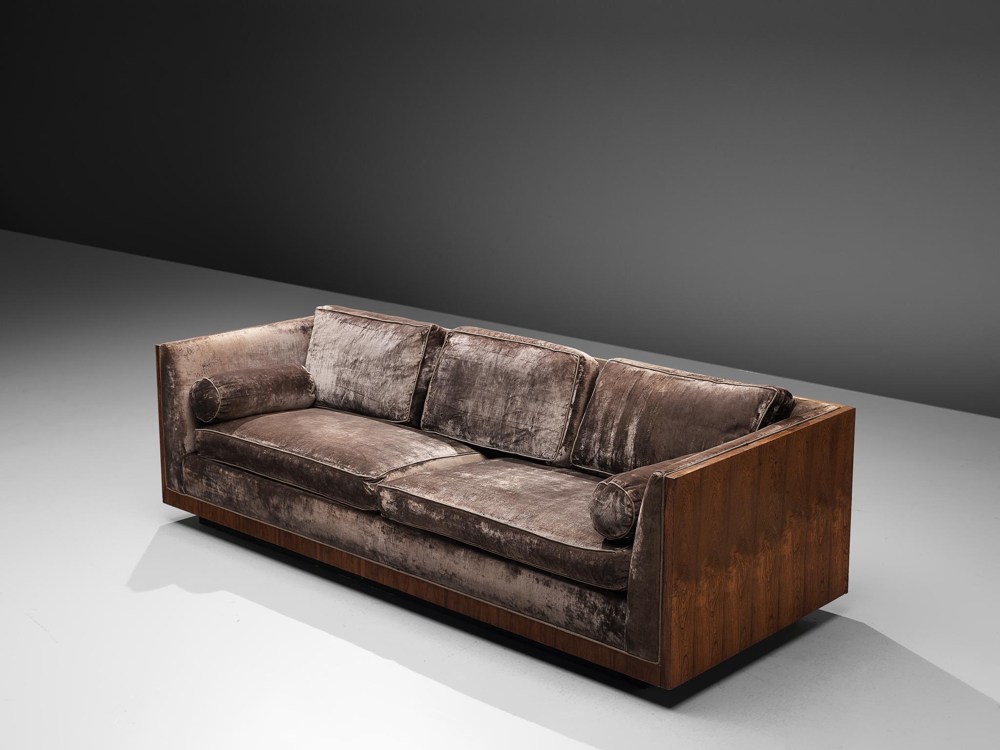 Milo Baughman, sofa, grey velvet, rosewood, United States, circa 1965

This three-seat 'basket' sofas is designed in circa 1965. The soft colored cushions fall perfectly in the rosewood frame of this settee. The design of this sofa is very