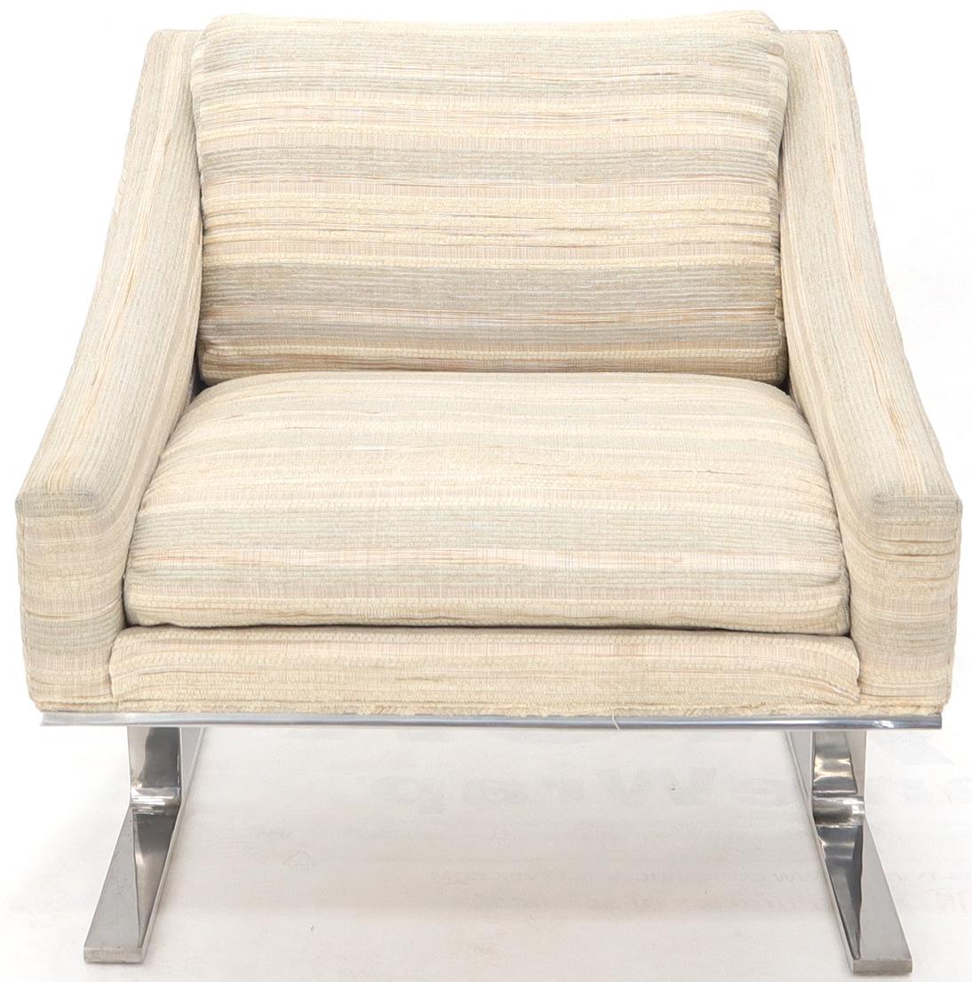 Mid-Century Modern heavy polished stainless steel frame scoop chair by Kipp Stewart for Directional. 