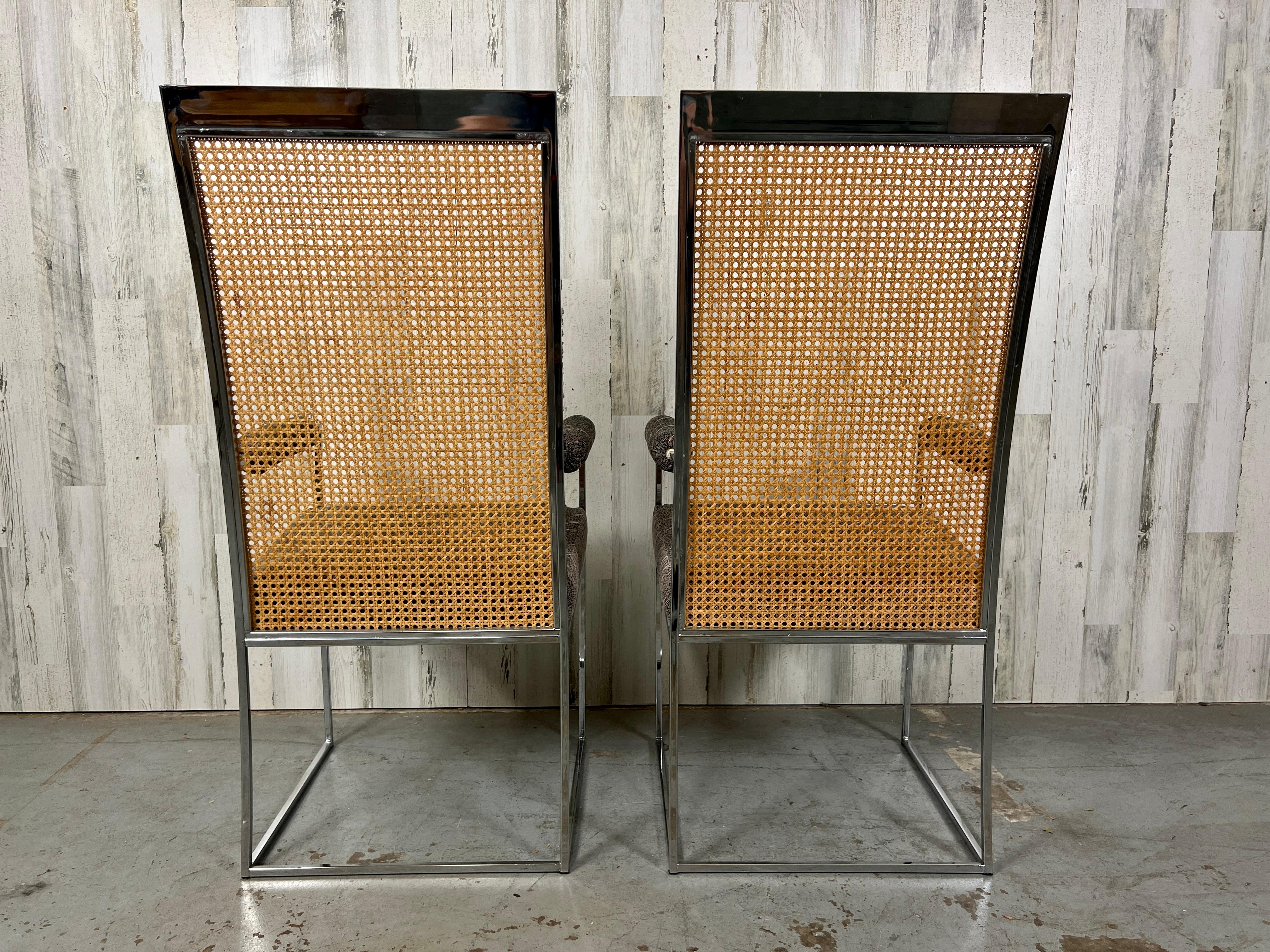 Chrome high back armchairs with cane back and original upholstery.
Deigned by Milo Baughman and manufactured by Thayer Coggin.
The fabric is very clean or new upholstery may be desired.
