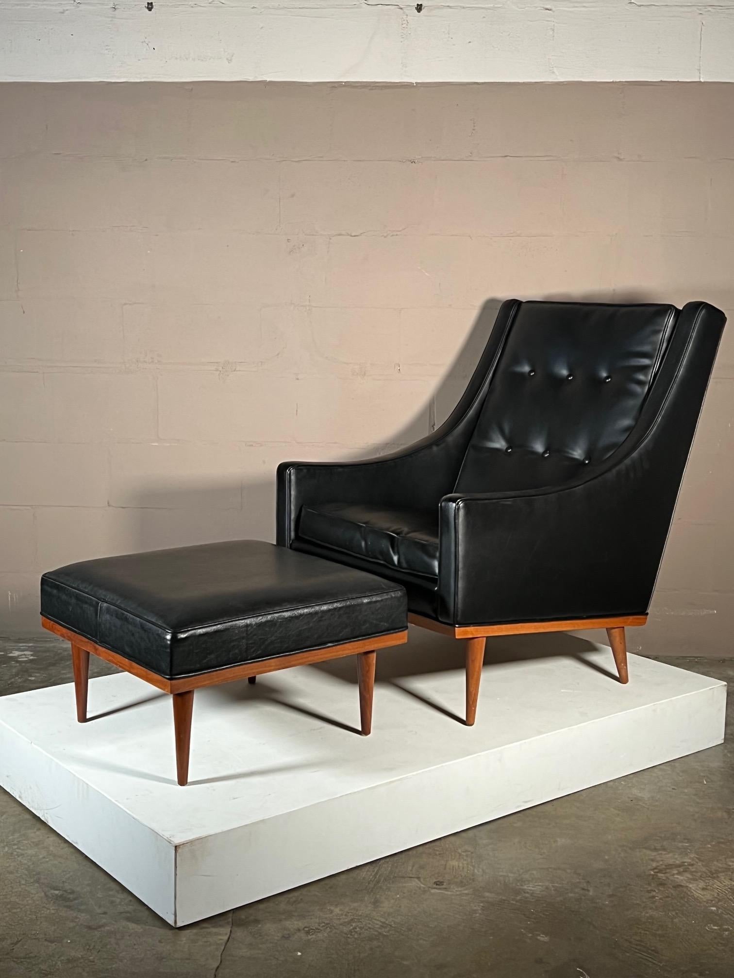 A classic high back lounge chair with matching ottoman. Designed by Milo Baughman for James Inc, High Point, NC. This chair is very comfortable and stylish at the same time. Beautiful walnut frame and original leatherette upholstery.
