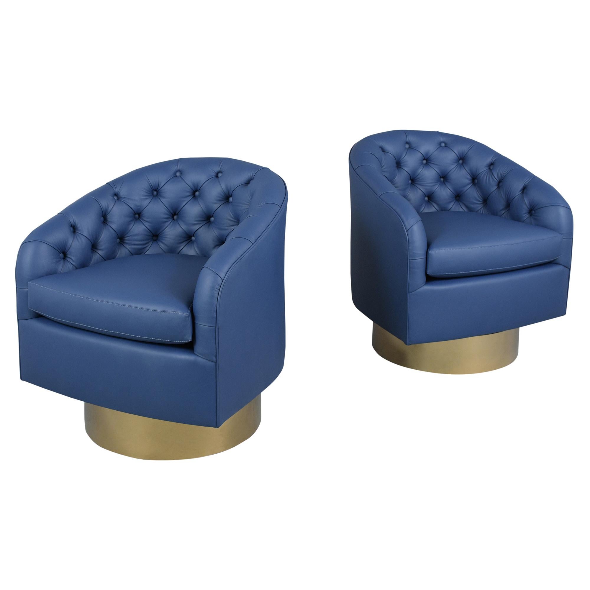 Experience the sophistication of mid-century modern design with our exquisite pair of vintage brass swivel lounge chairs, reminiscent of the iconic work of Milo Baughman. These chairs have undergone a meticulous reupholstering process by our skilled