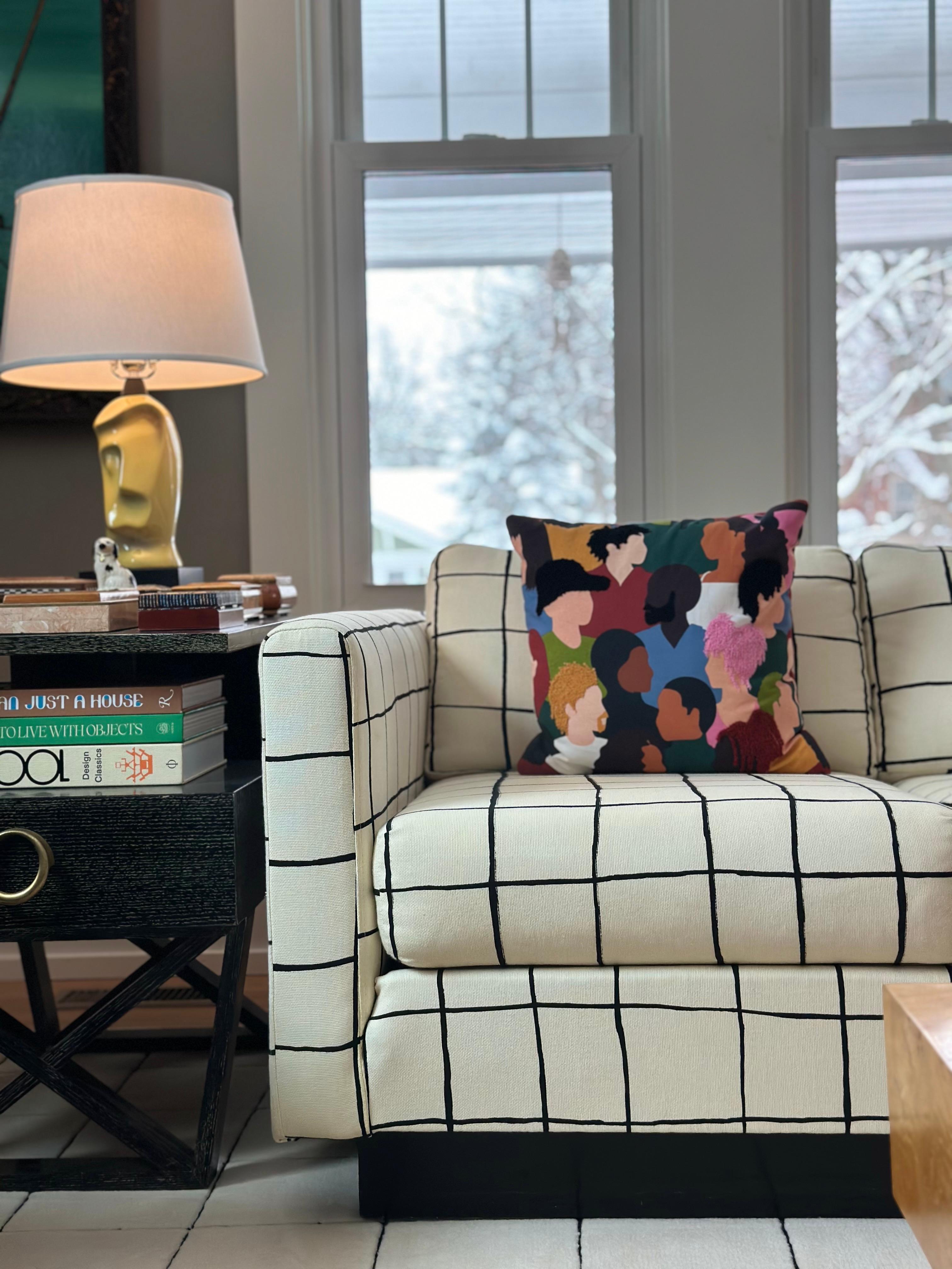 We are very pleased to offer a bold marriage of iconic design and modern artistry, a vintage Milo Baughman sofa reupholstered in Kelly Wearstler’s Modern Coquette fabric in Alabaster/Black.  The cotton textile features a striking hand-painted grid
