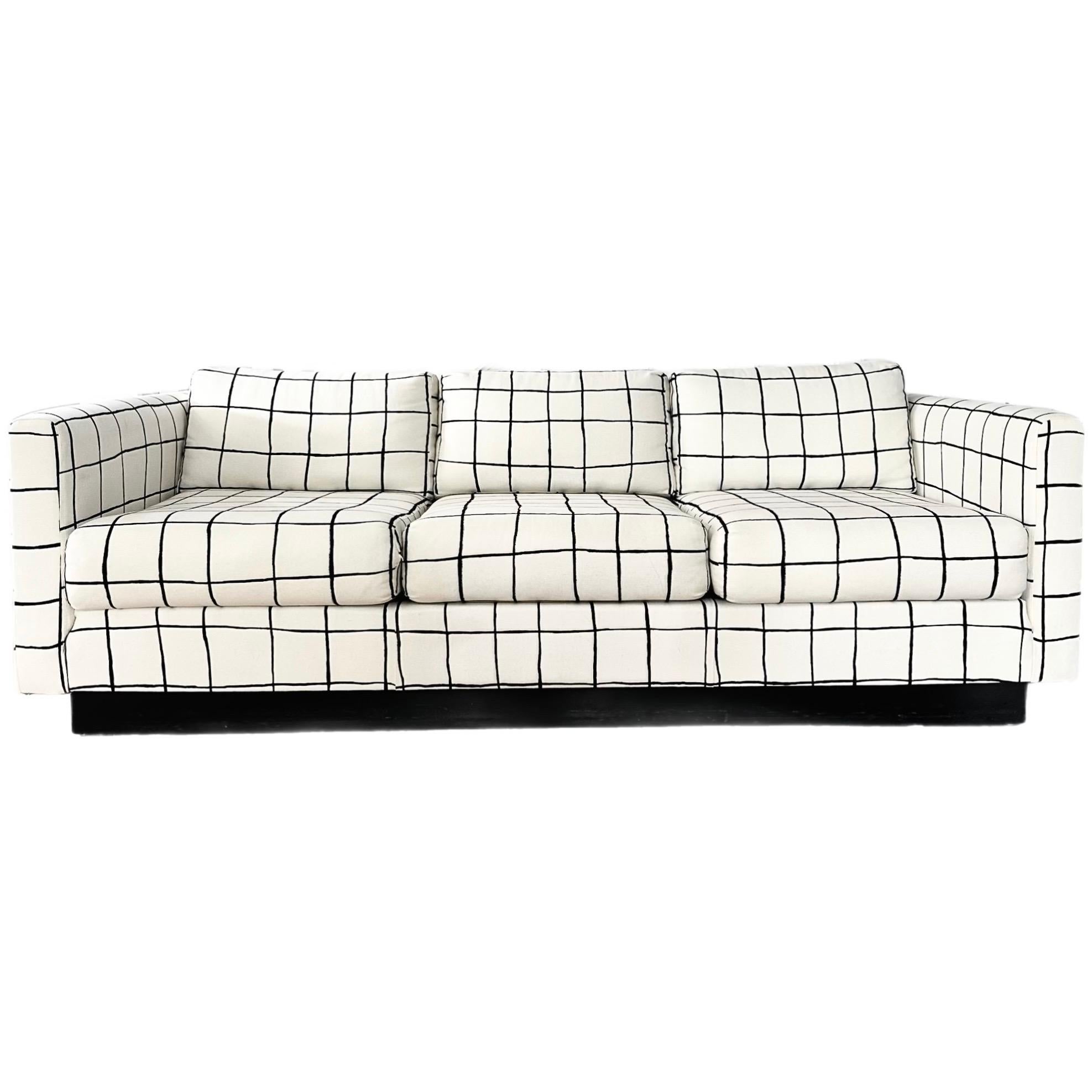 What is the difference between a club chair and an armchair?