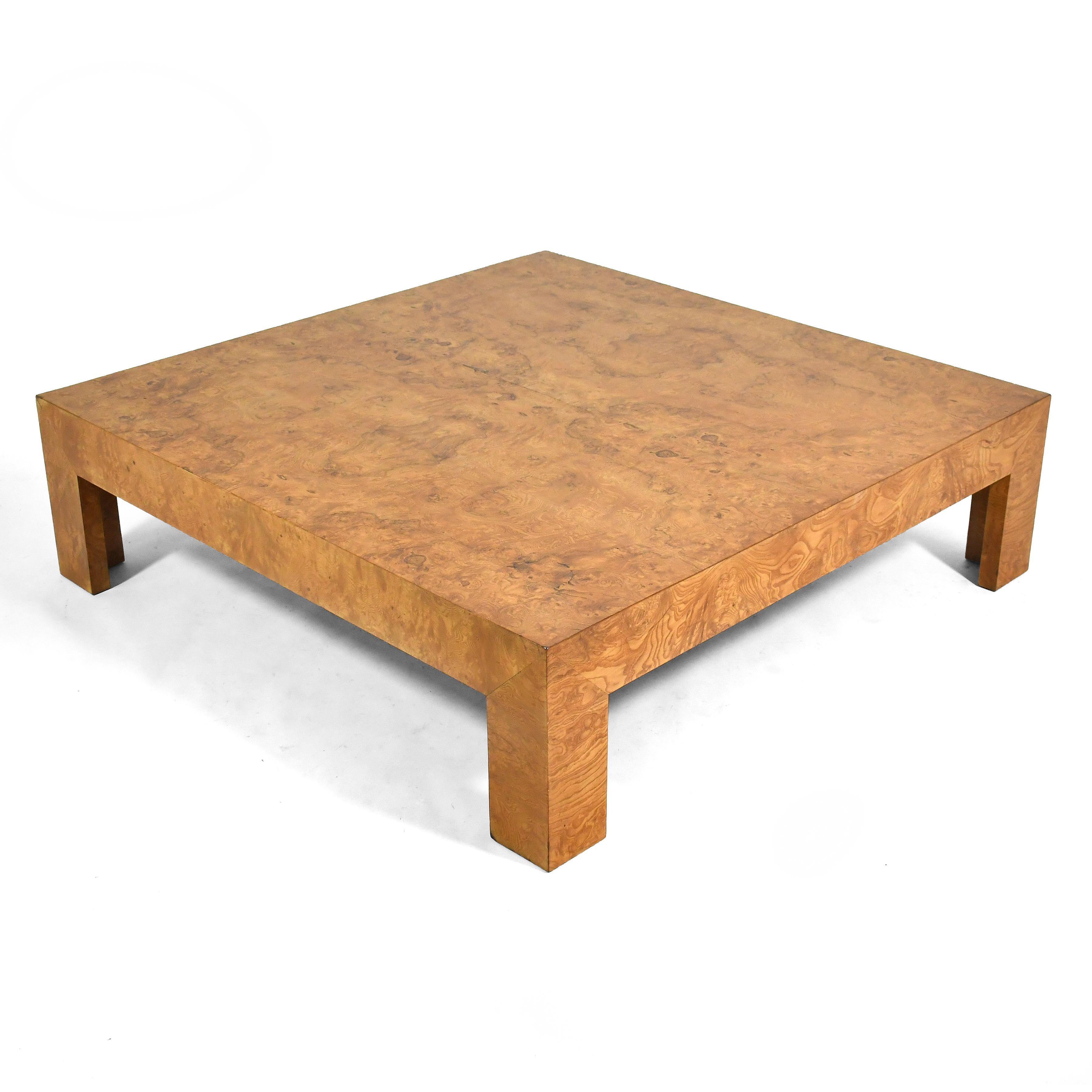Over 2,900 square inches of beautiful burled wood cover this large, dramatic coffee table by Milo Baughman for Directional. This table would be a striking centerpiece of a substantial seating group and the perfect platform for art and decorative