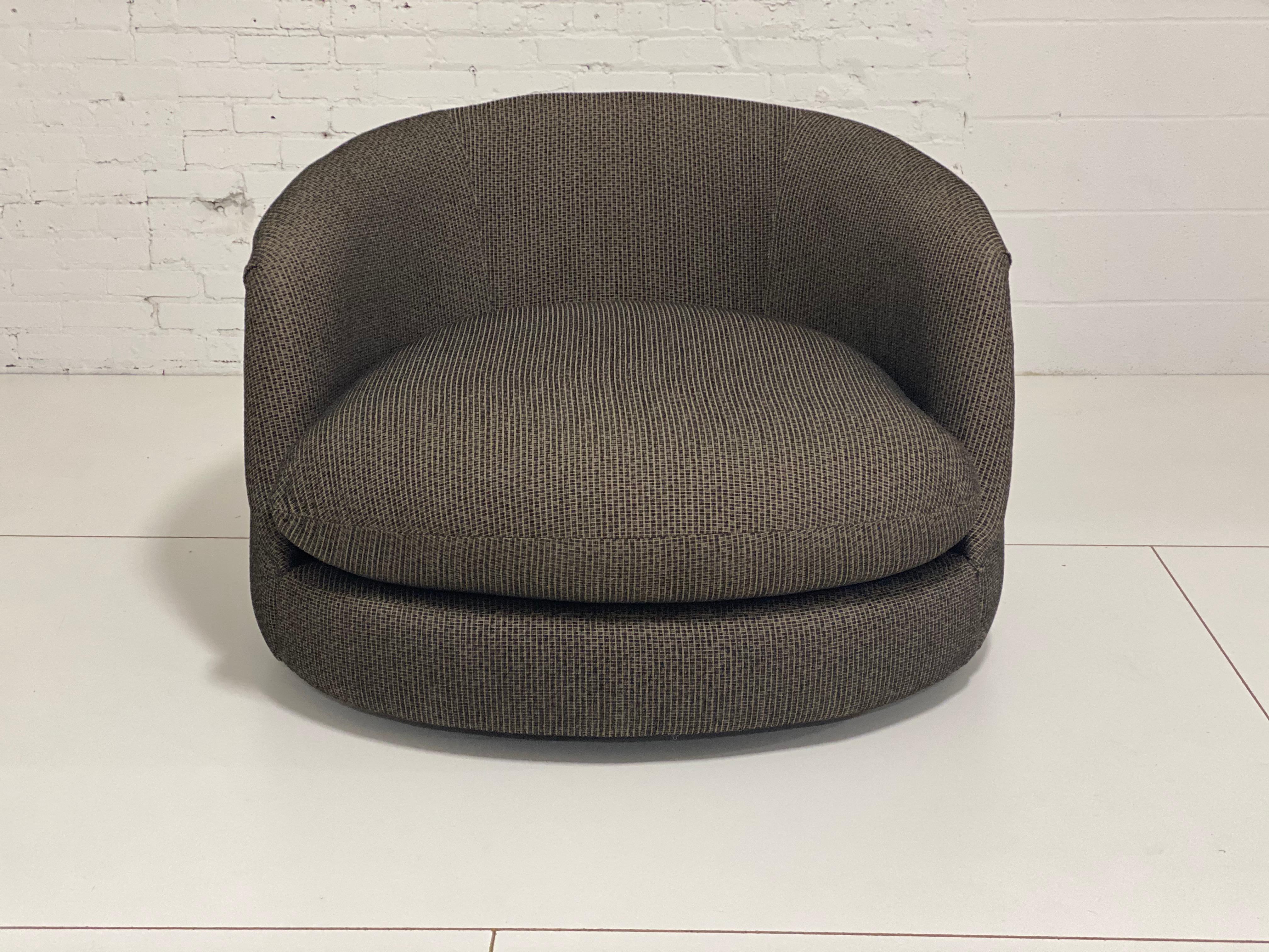 Oversize swivel chair by Milo Baughman for Thayer-Coggin. Original fabric and chrome swivel base in great condition.