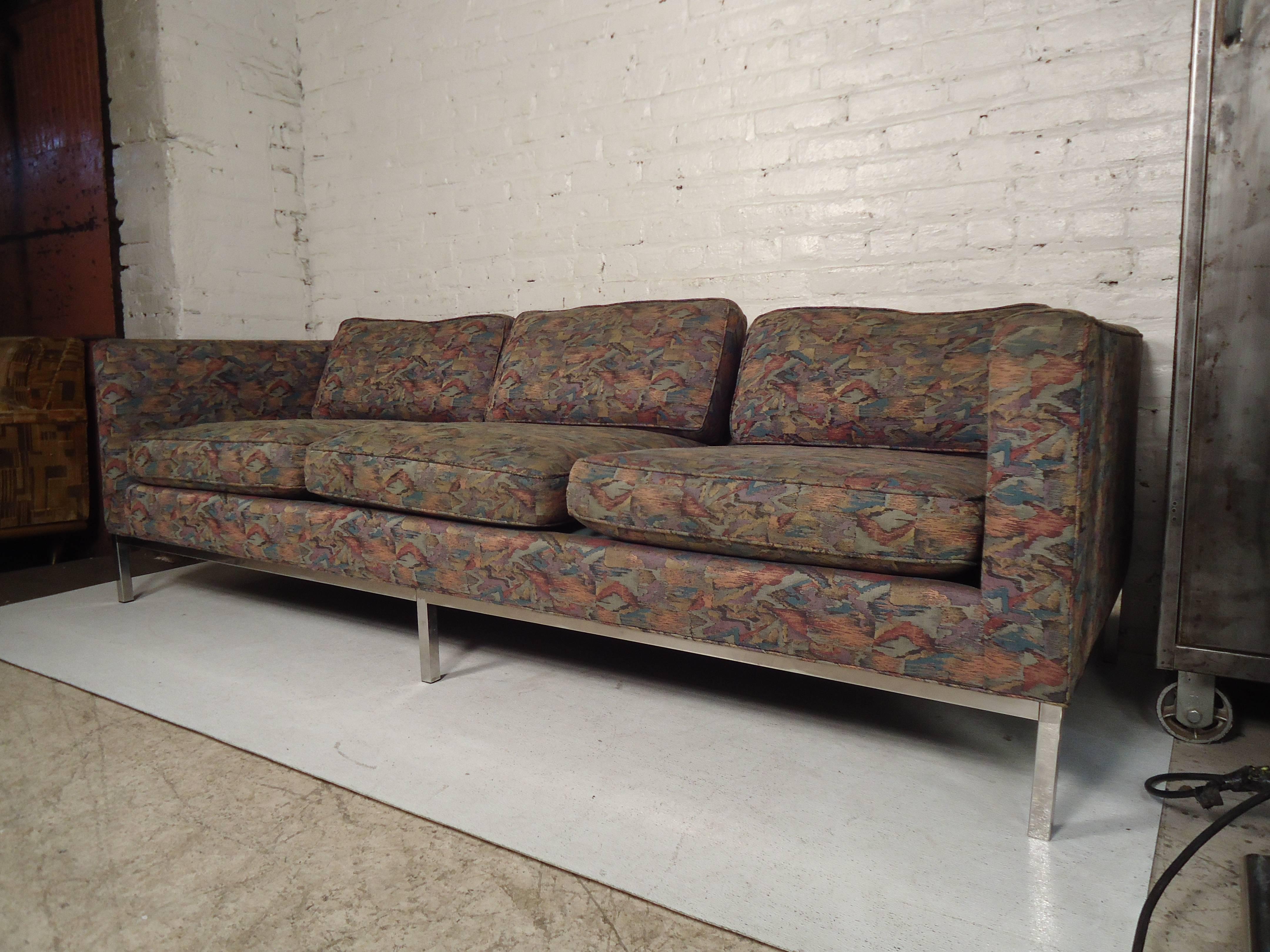 Vintage mid-century modern three-seat sofa with polished chrome trim and legs. Designed by Milo Baughman for Thayer Coggin. Upholstery is original and vibrant!

(Please confirm item location NY or NJ with dealer).
 