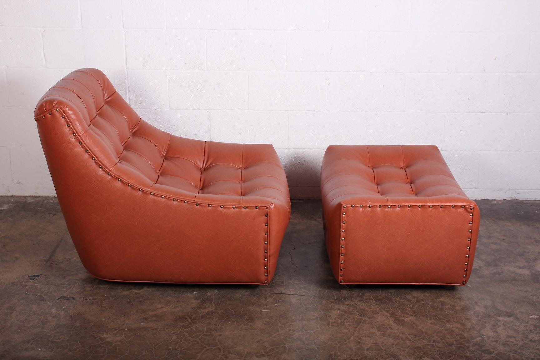 A rare lounge chair and ottoman on casters designed by Milo Baughman for Thayer Coggin.
