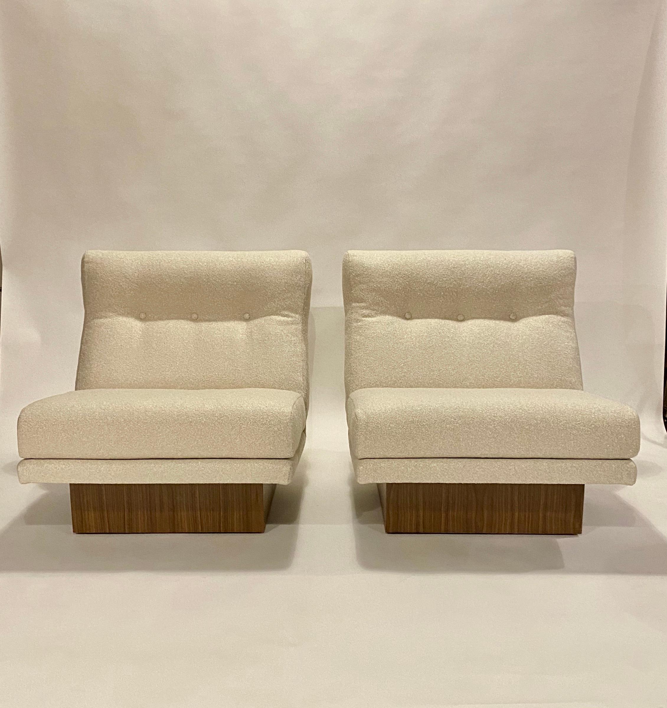 Mid-20th Century Milo Baughman Lounge Chairs on Walnut Plinths