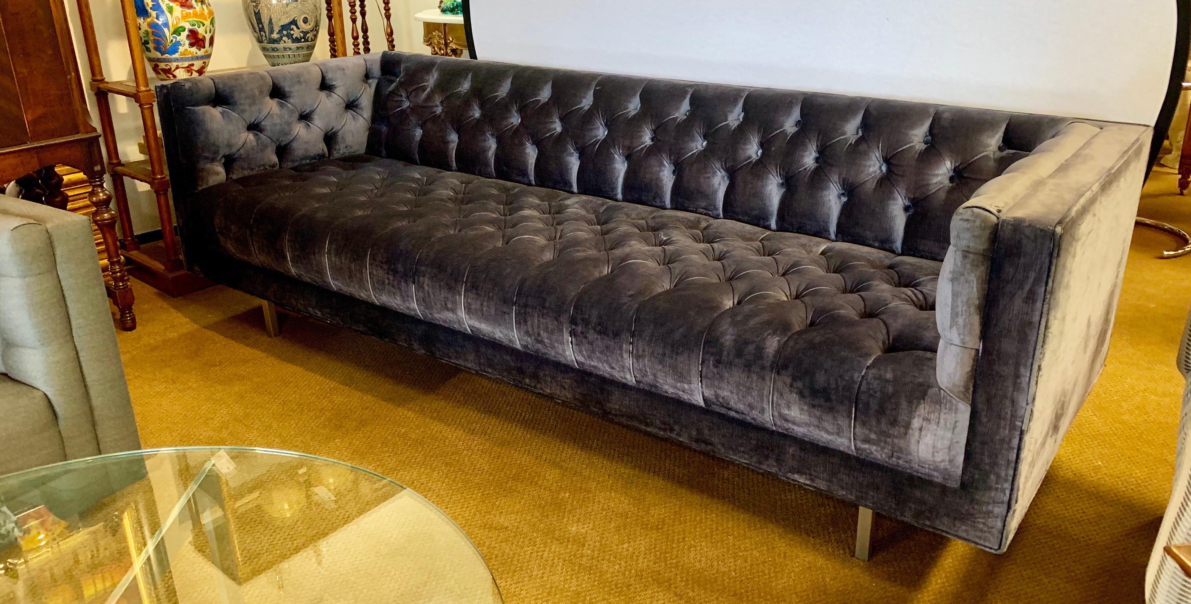 Stunning Milo Baughman style chesterfield with a low pile velvet fabric that looks like a charcoal blue color with hints plum, a real eye catcher. This custom piece is nothing short of spectacular. Sleek and modern and oh so comfortable!