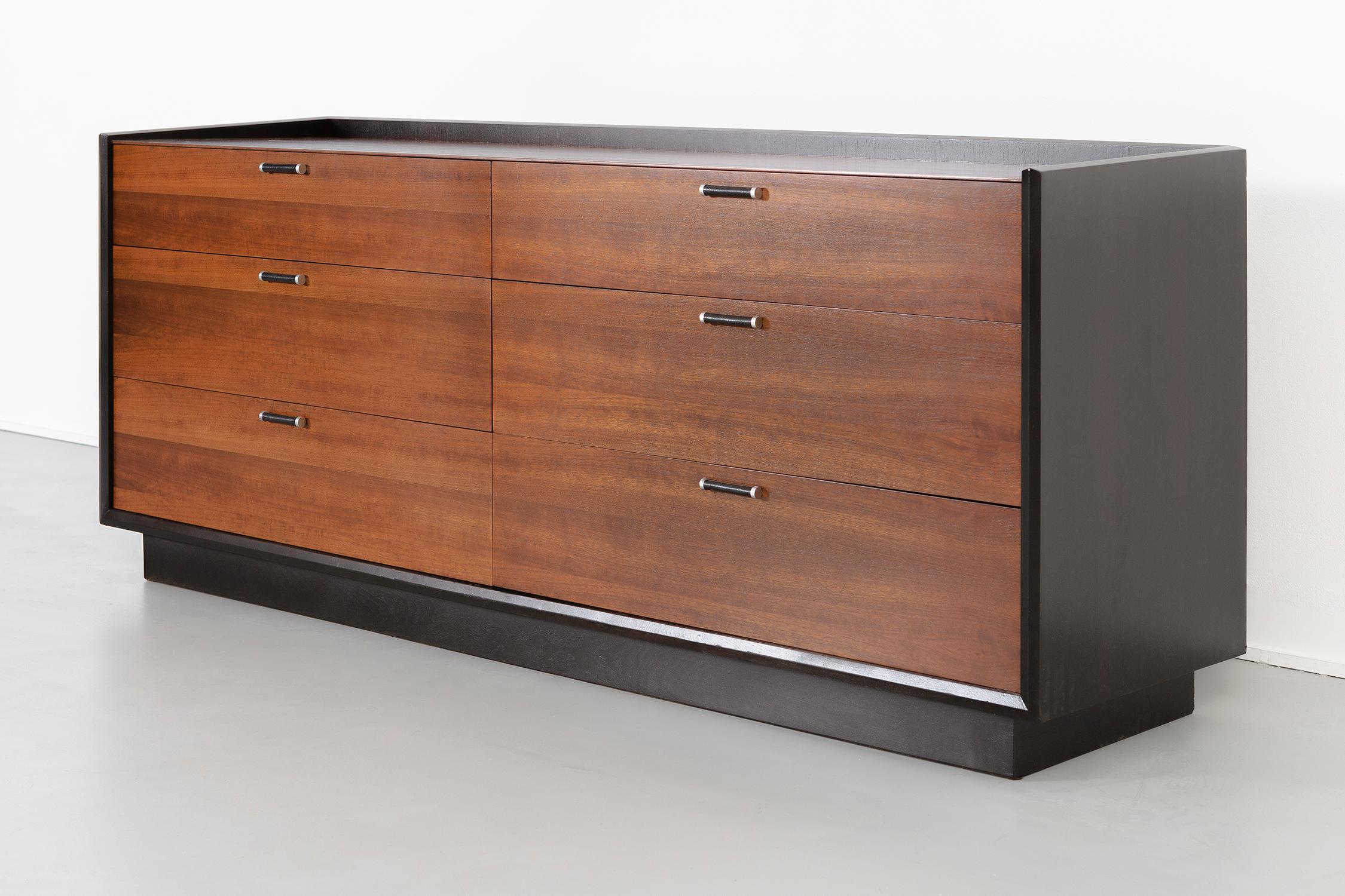 Credenza

designed by Milo Baughman for Glenn of California

USA, circa 1960s

Walnut with leather and aluminum pulls

Measures: 29 ¾” H x 72” W x 20 ?” D.