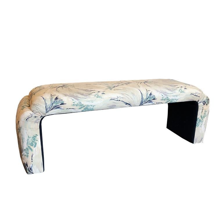 Midcentury Milo Baughman waterfall bench seating. Features a pattern of artistic brush strokes and flora on the front and sides, and a navy blue on the underside. Four metal discs on the bottom of each side to protect flooring. Sides feature a