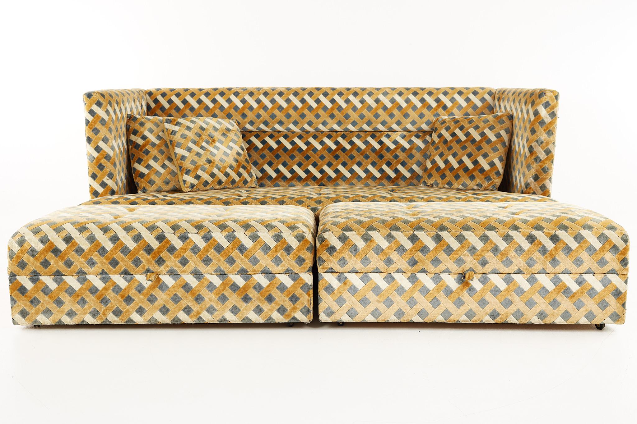 Milo Baughman mid-century shelter sofa and ottomans

The sofa measures: 90 wide x 44 deep x 37 high, with a seat height of 17 inches and arm height of 37 inches
Each ottoman measures: 44 wide x 23 deep x 16 high, with a seat height of 16