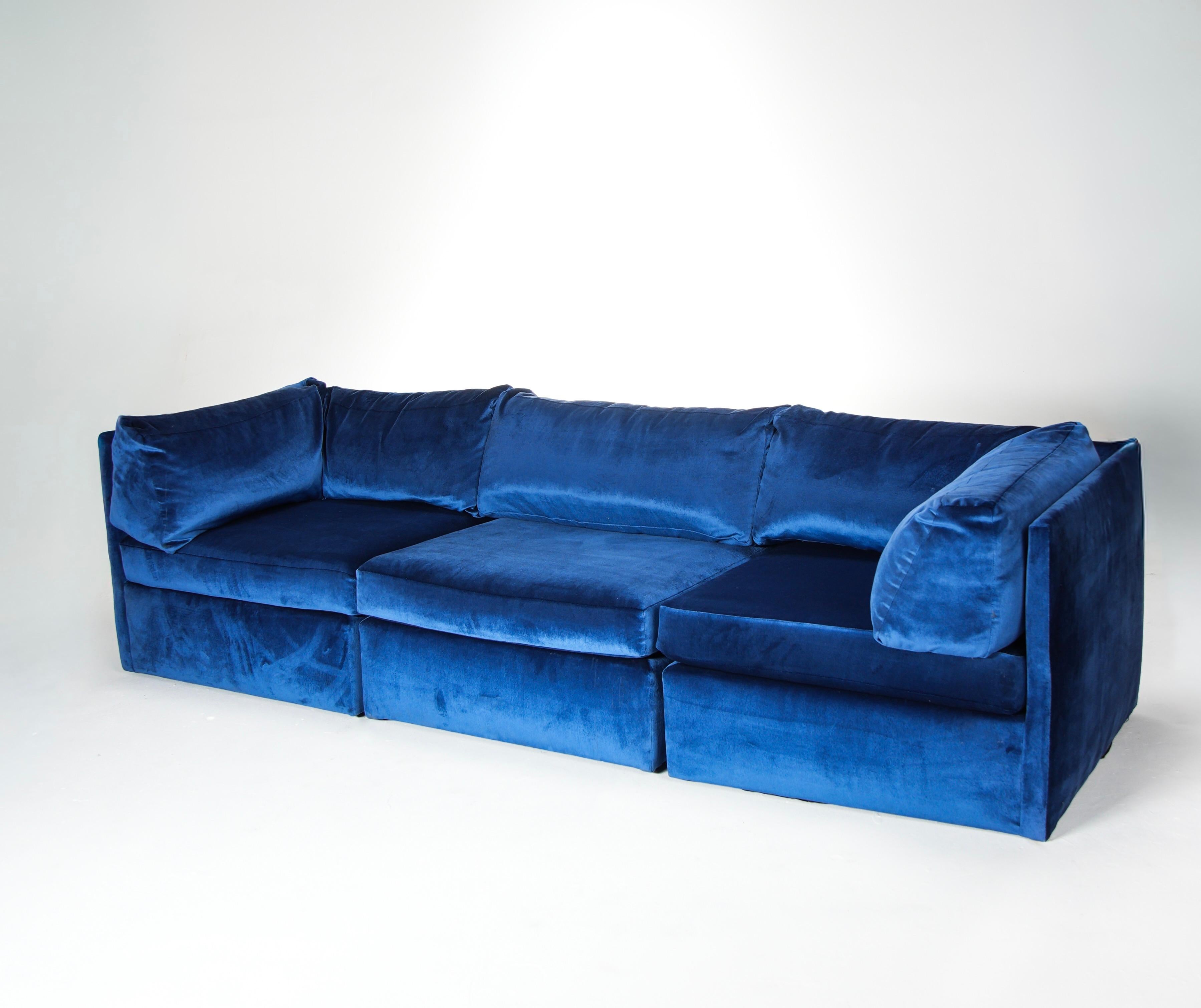 Milo Baughman modular sofa with three sectionals in blue velvet. Allows flexibility to arrange in armless, corner units, or midsection  configurations.