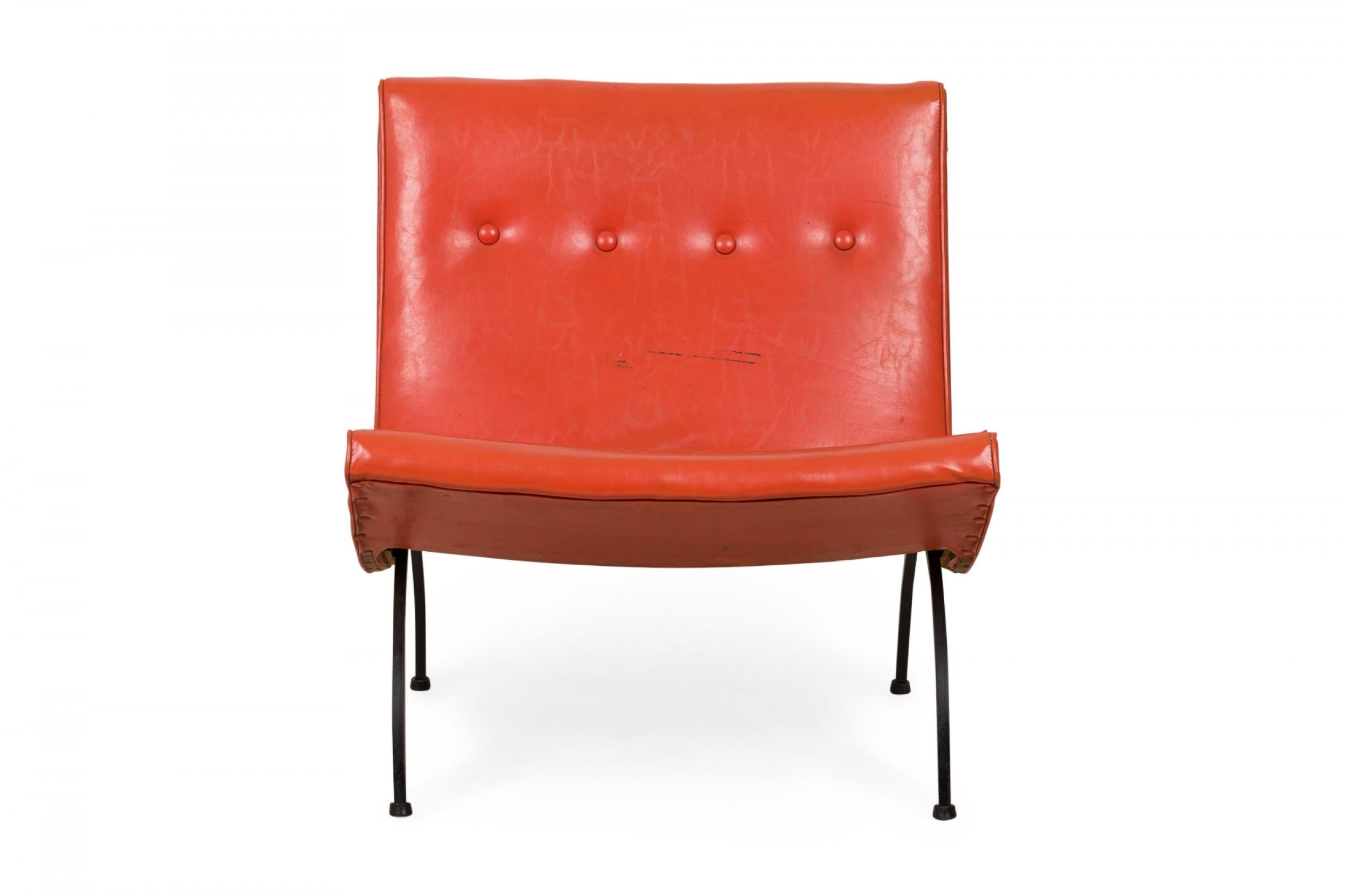 American mid-century slipper / side chair with orange vinyl button tufted upholstery, resting on four curved wrought iron legs ending in small circular feet. (Milo Baughman).
     