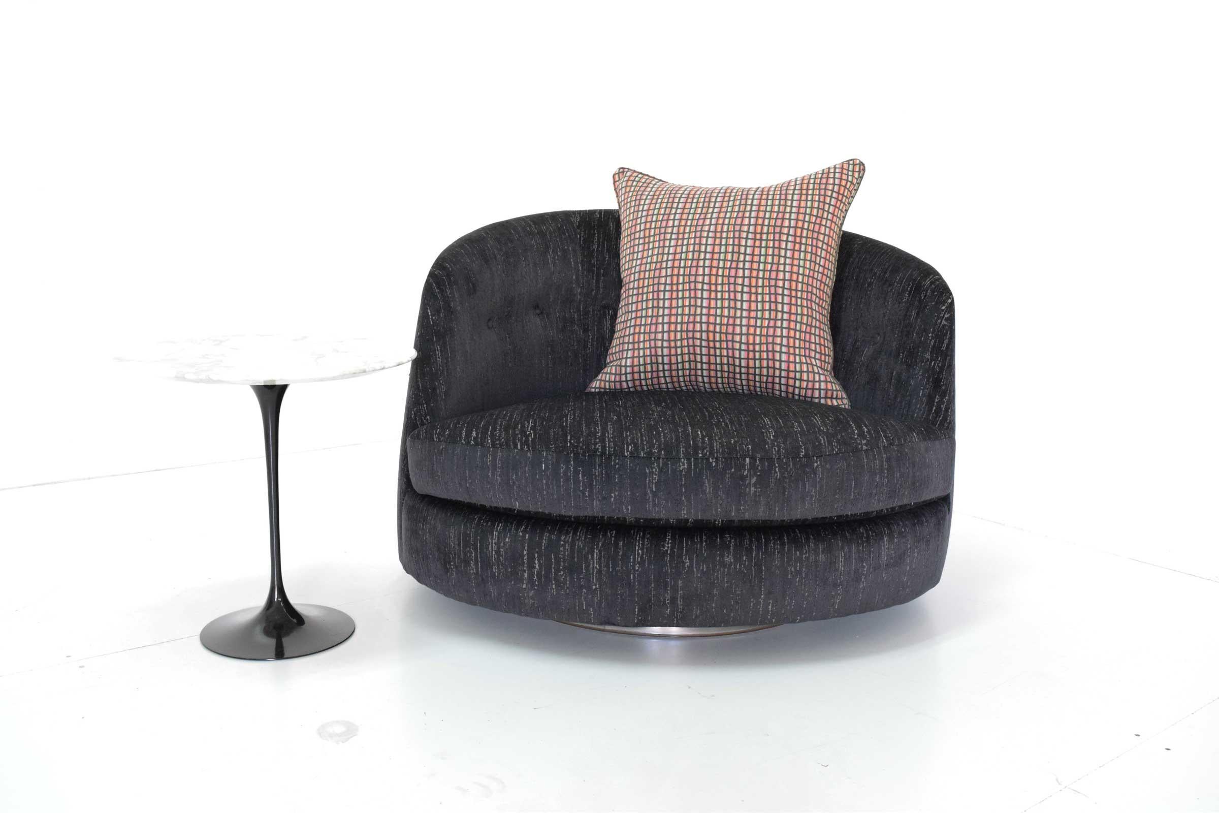 New upholstery. Milo Baughman for Thayer Coggin. Upholstered in a black cut velvet these oversized Milo Baughman tub chairs look great. Chrome base.