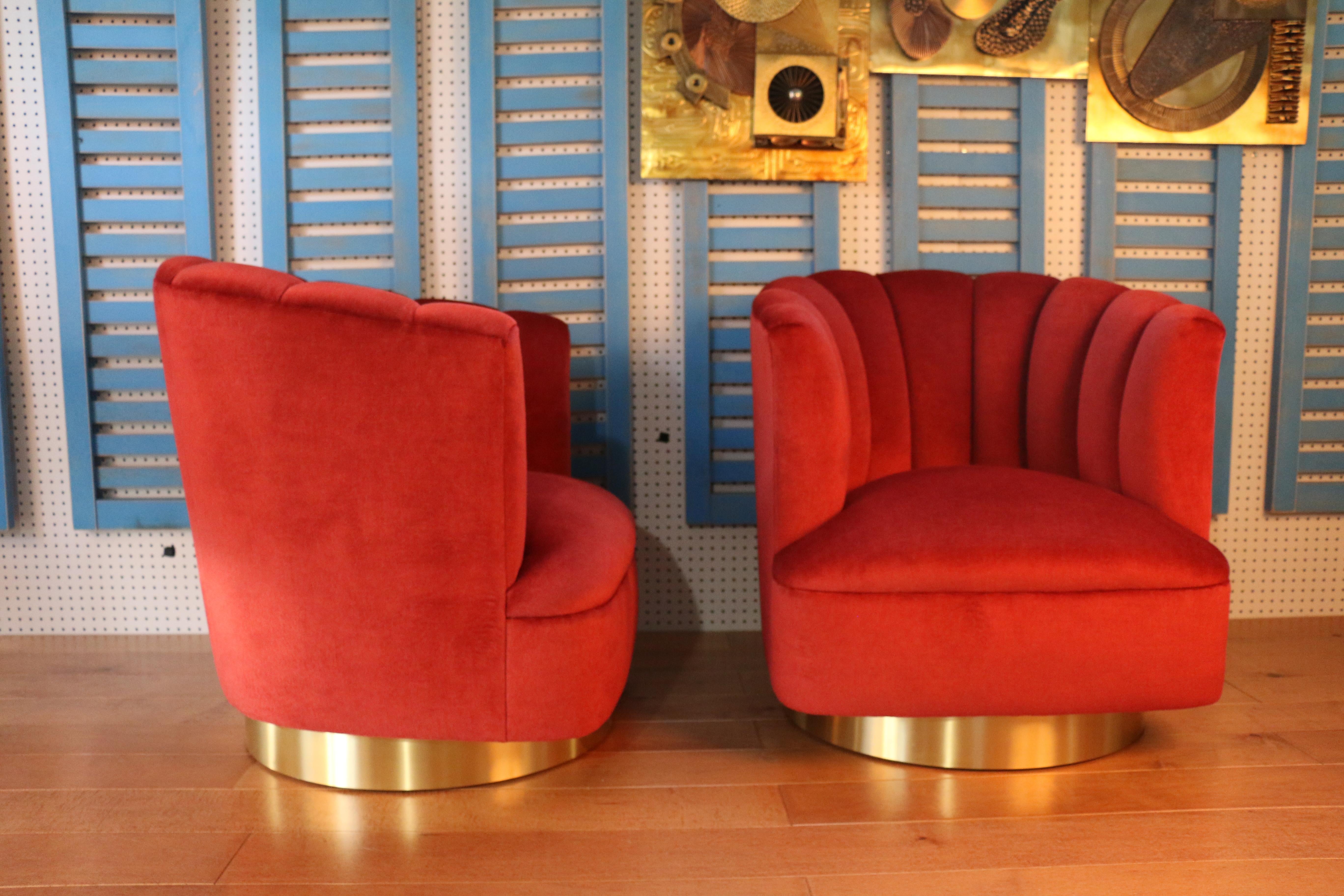 Milo Baughman style mohair lounge chairs. These chairs bases were remade and in good condition. The fabric on these chairs is mohair. They also swivel correctly and are very comfortable. Well-kept round brass base.