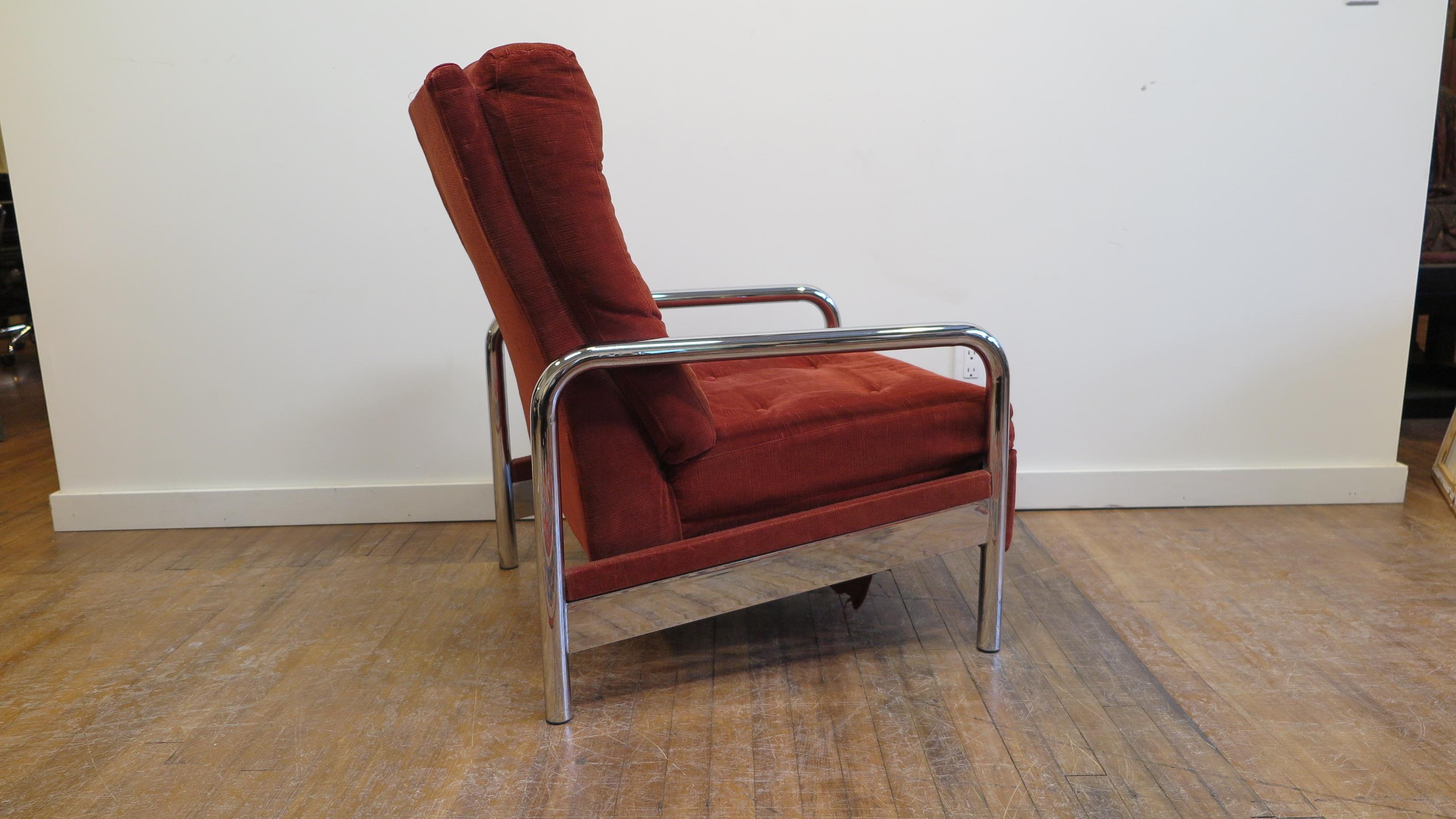 Milo Baughman reclining lounge chair. Chrome tubular frame in very good condition, upholstery is faded, new upholstery is recommended. Works great very comfortable. A great value make it your own with new upholstery. Upholstery service available for