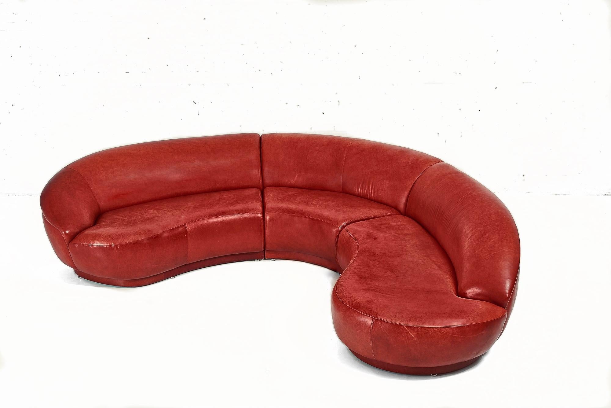 Thayer Coggin Milo Baughman biomorphic sectional sofa. Made by Thayer-Coggin, circa 1990. Original red leather

