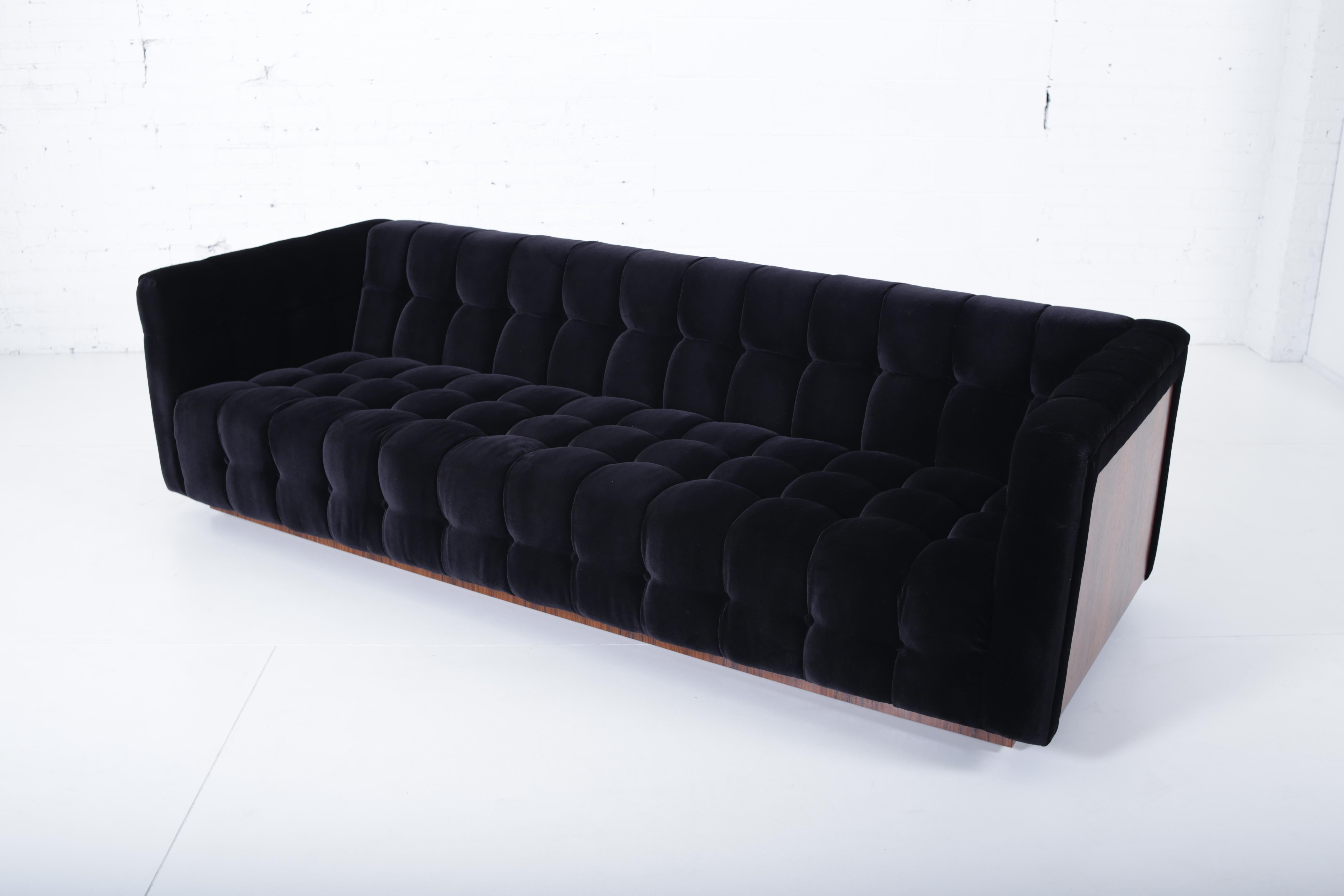 Milo Baughman tuxedo sofa with rosewood panels. Fully restored, refinished, and reupholstered in black velvet.