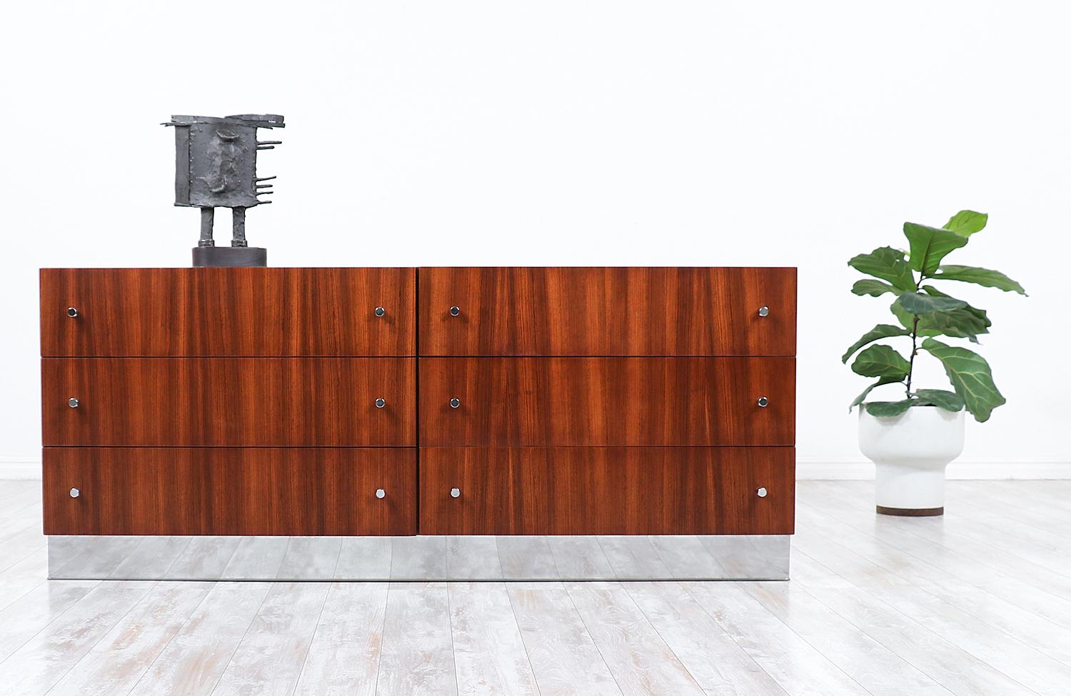 Milo Baughman rosewood & chrome dresser for Thayer Coggin.

________________________________________

Transforming a piece of Mid-Century Modern furniture is like bringing history back to life, and we take this journey with passion and precision.