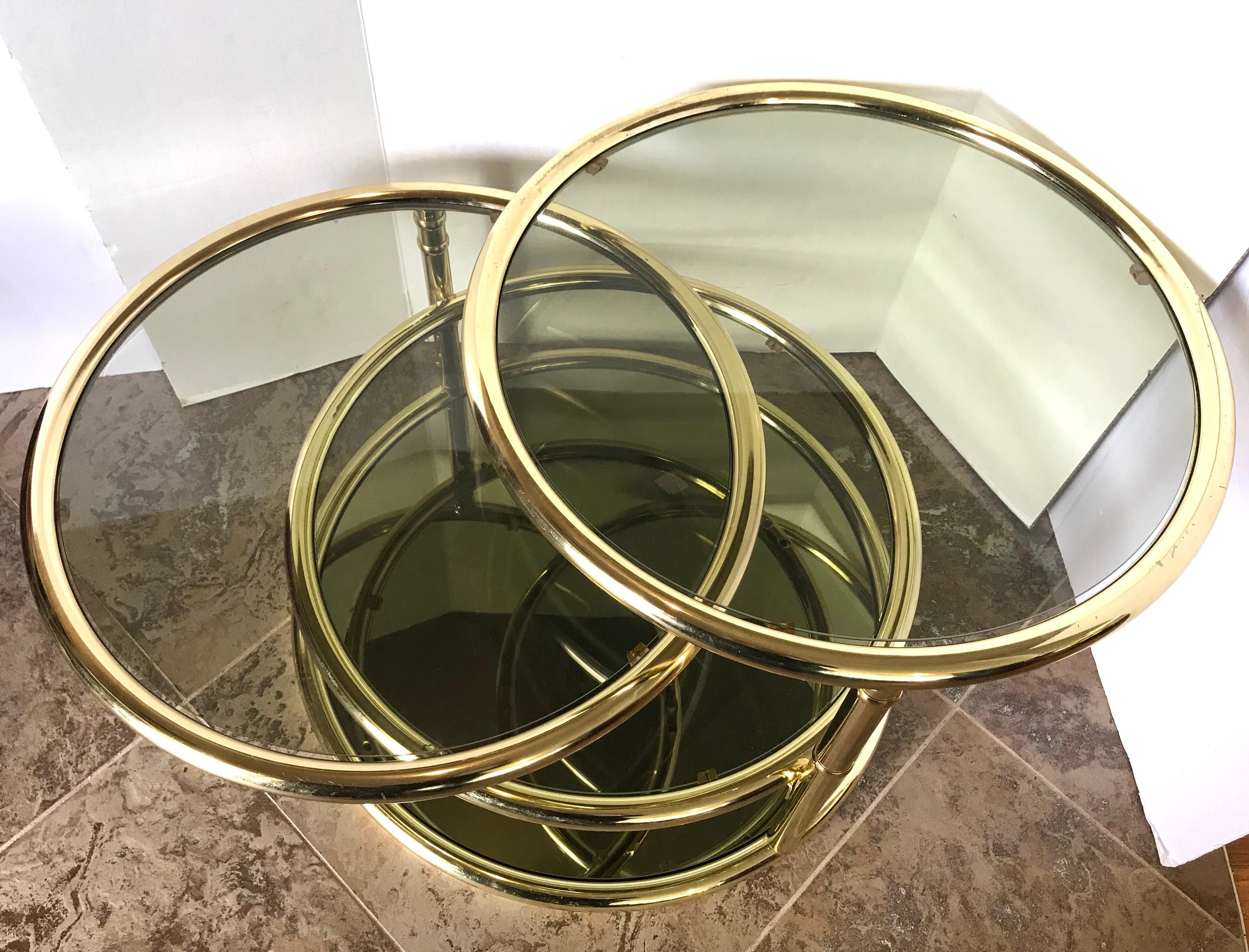 Milo Baughman Round Disc Four Tiered Brass and Glass Floating Cocktail Table DIA In Good Condition In West Hartford, CT