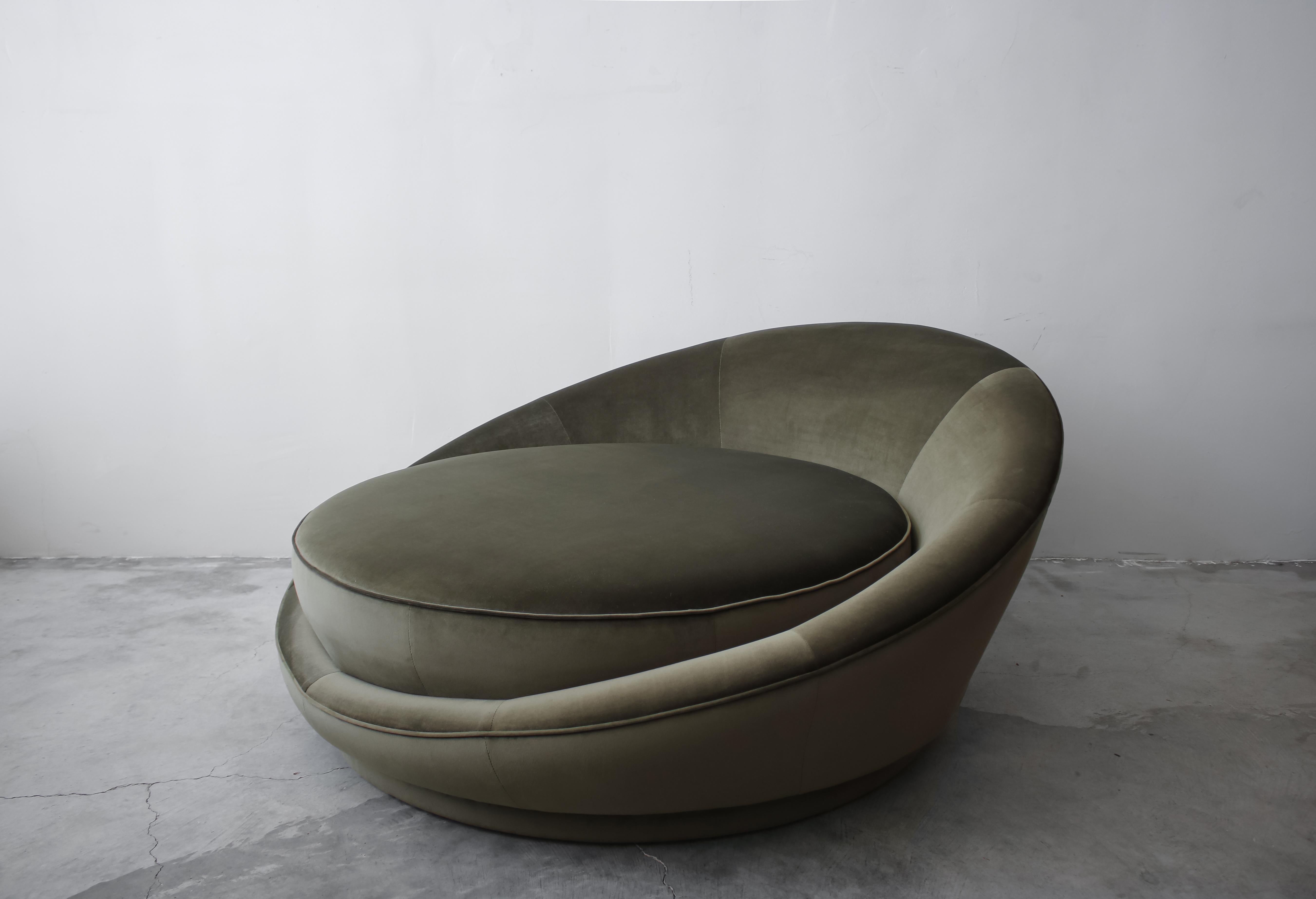 Midcentury oversized circular chaise, cuddle style chair by Milo Baughman for Thayer Coggin. Perfect for that cozy corner.

Chair has been professionally reupholstered in a beautiful green micro velvet and is ready for its new home.