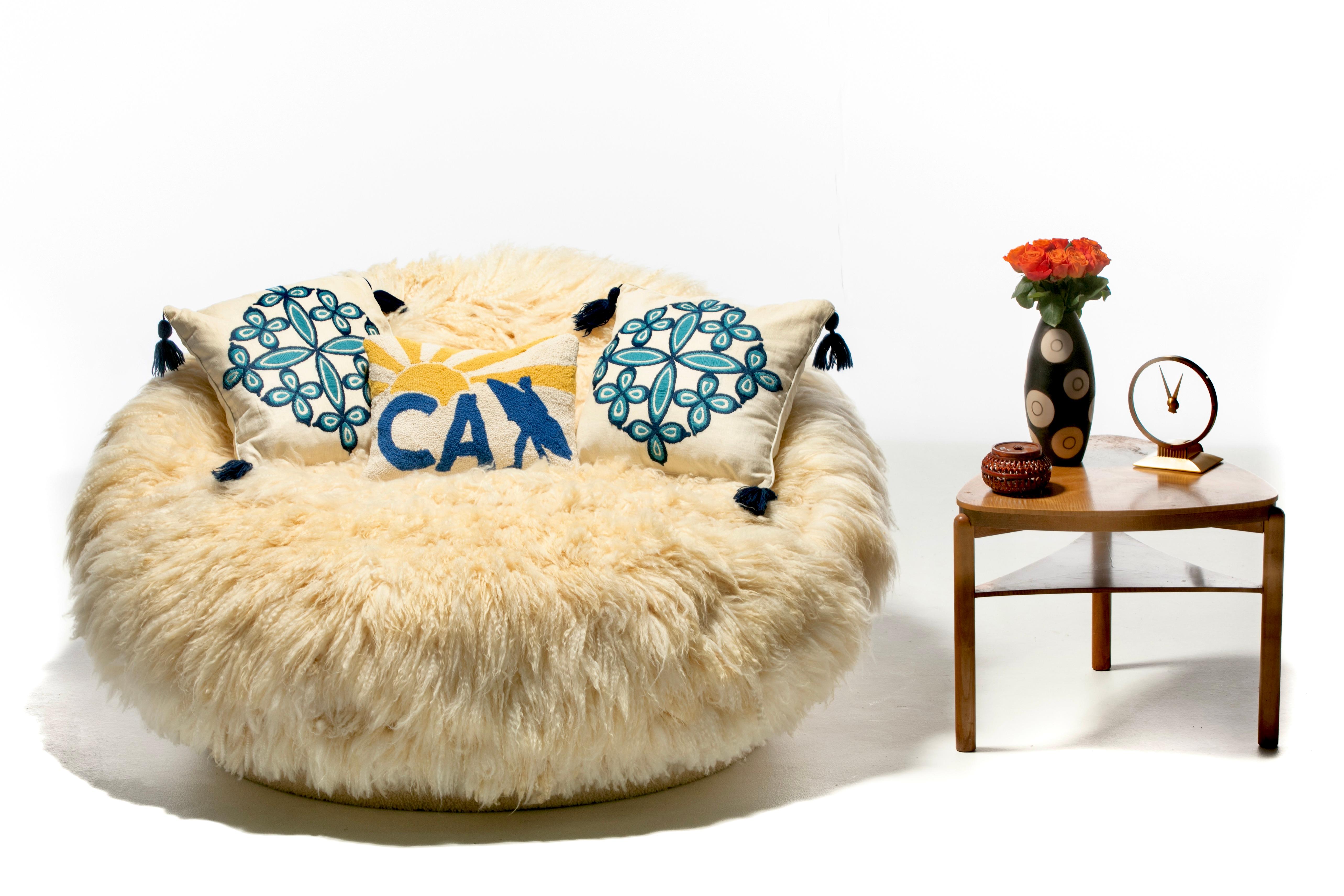 Let most famous Mid Century Modern Designer Milo Baughman take you up in space in this big 1960s Satellite Chair covered in new luxuriously soft Napa Valley Sheepskins and Ivory Shearling. Hand sewn sheepskin hides. Comfy to snuggle with your