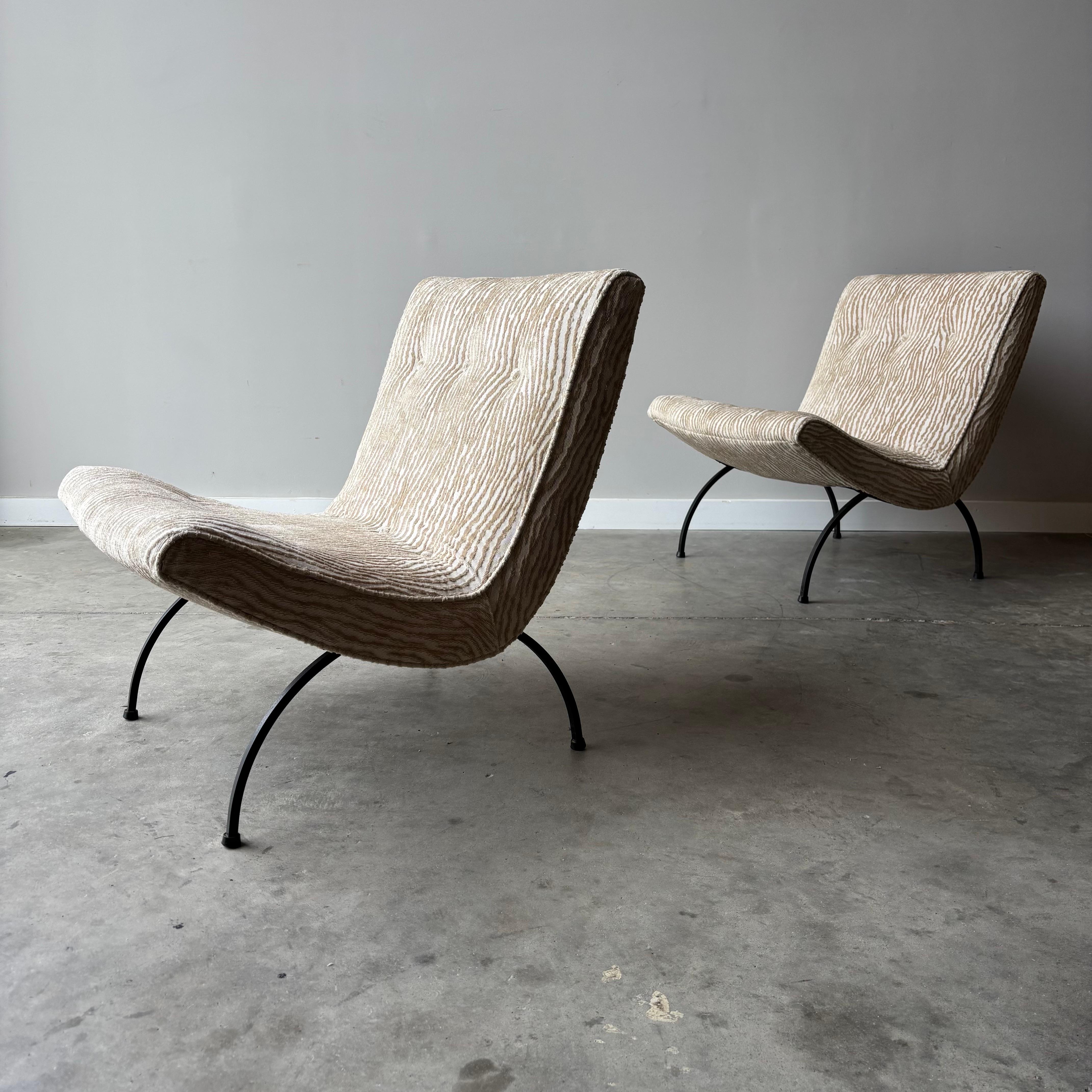 A simple sculptural form and comfortable sit to the classic scoop chairs by Milo Baughman.  Newly upholstered in Schumacher Gunta cut velvet, a minimal and stunning pair.  