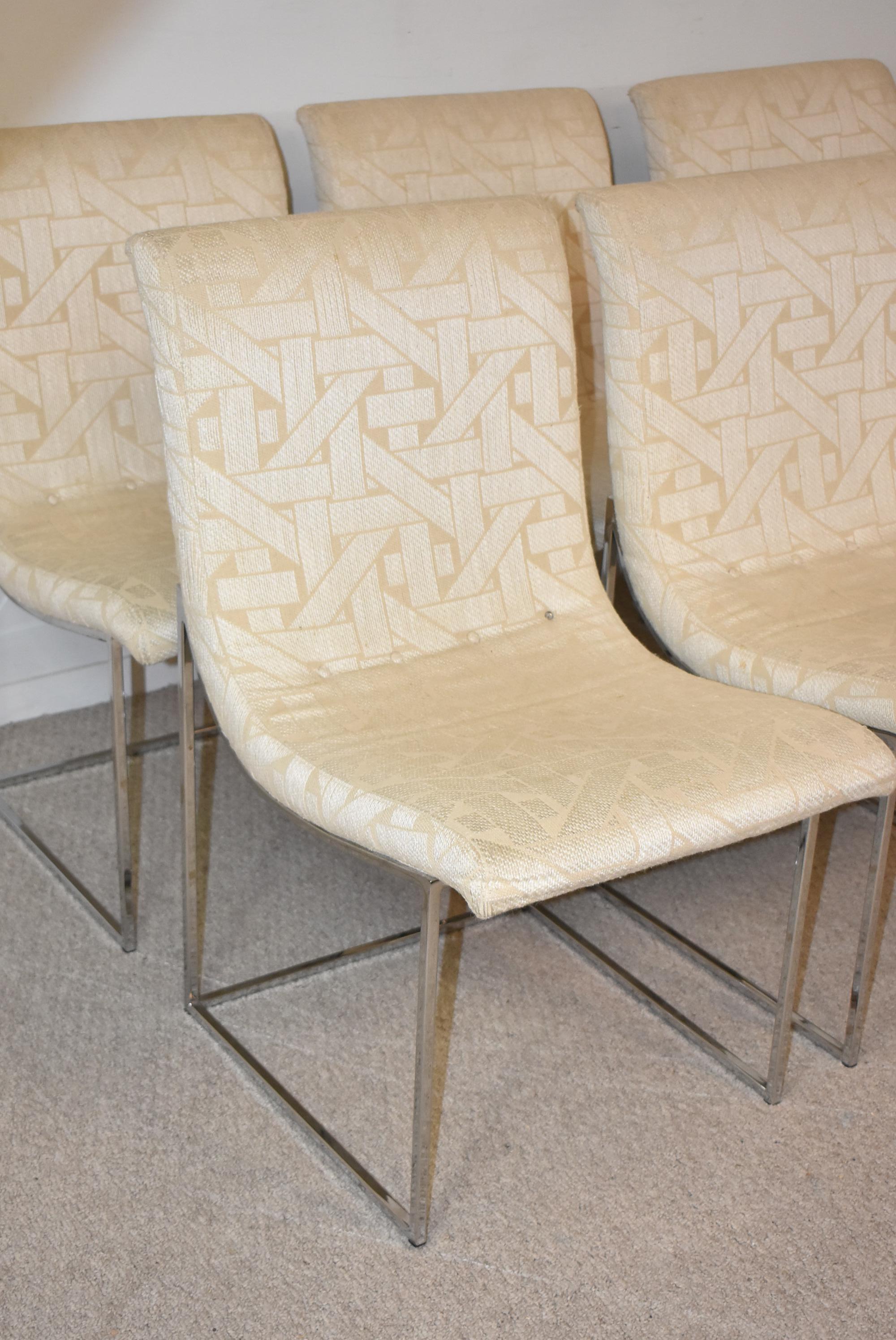 Set of 6 Milo Baughman scoop dining chairs manufactured by Thayer Coggin, Model 1228. These chic chairs feature scoop seats that sit in square tube chrome frames. Frames are in excellent condition. The original geometric pattern fabric shows wear