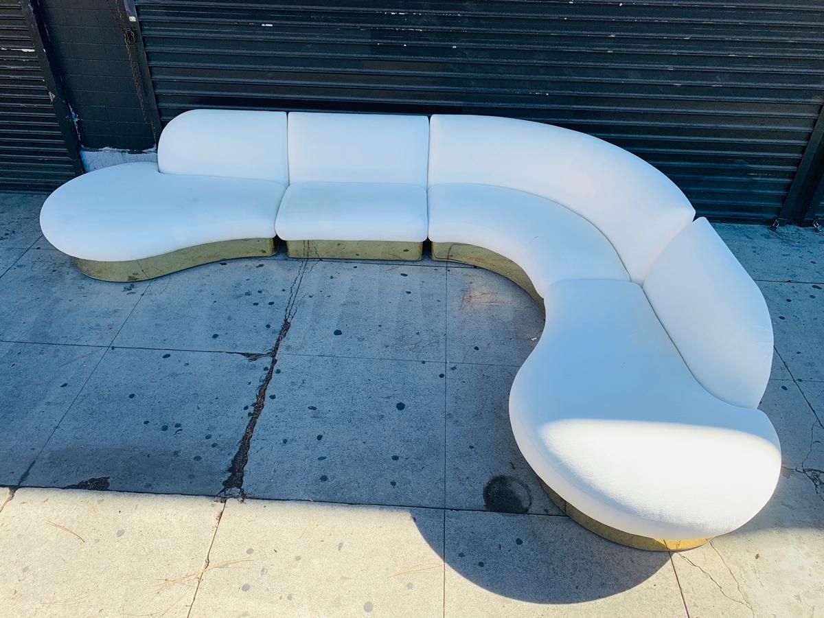 Exceptional vintage chrome curved sectional sofa designed by iconic designer Milo Baughman for Thayer Coggin, circa 1970s. Stunning three-piece sectional sofa with an elegant curve frame and a sleek brass base. The sofa is all original retaining the