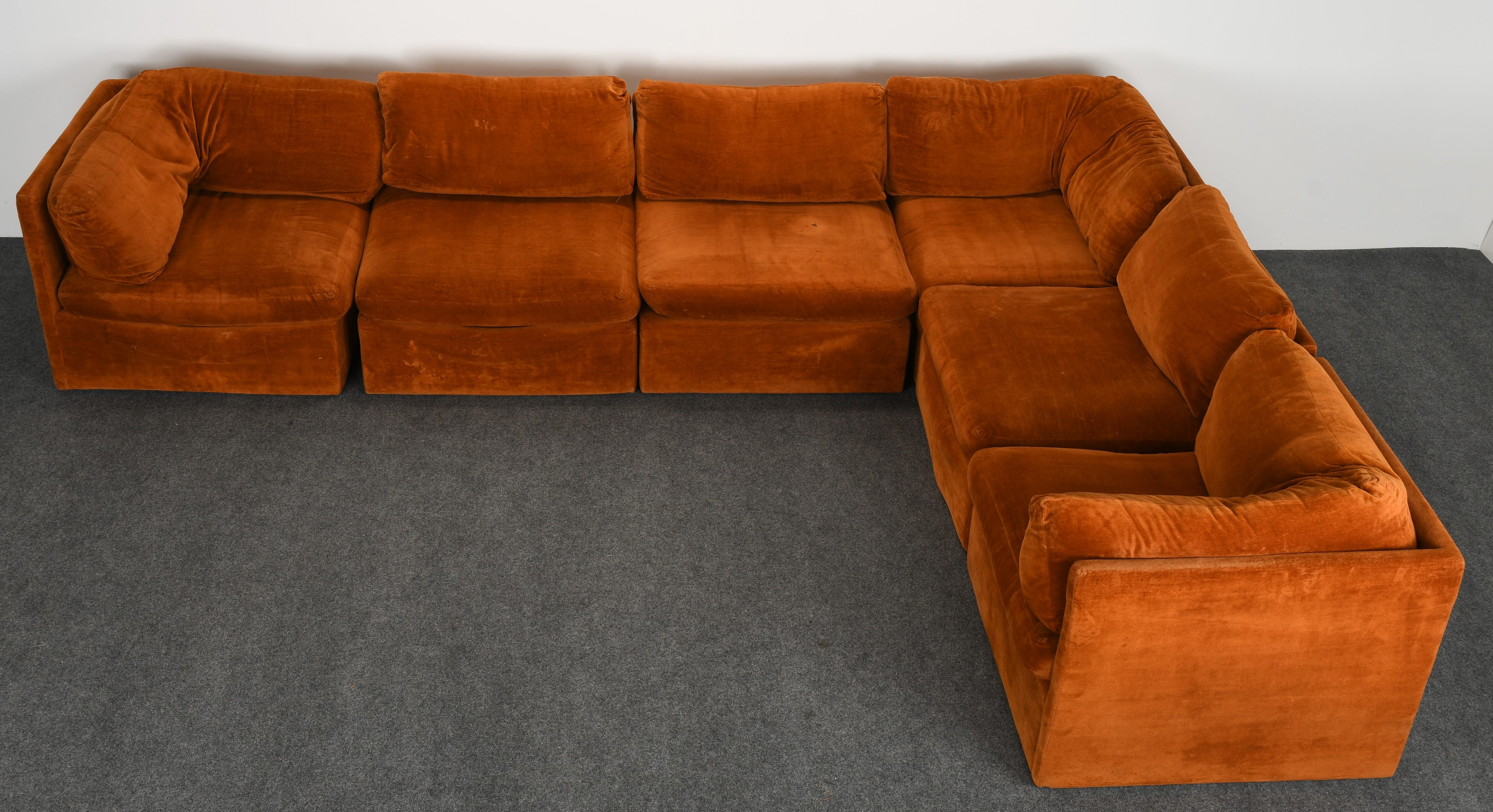 A comfortable sectional sofa designed by Milo Baughman for Thayer Coggins. This sofa is comprised of six sections which can be modified to your specifications. The fabric is in vintage condition, reupholstery is necessary. The sofa is structurally