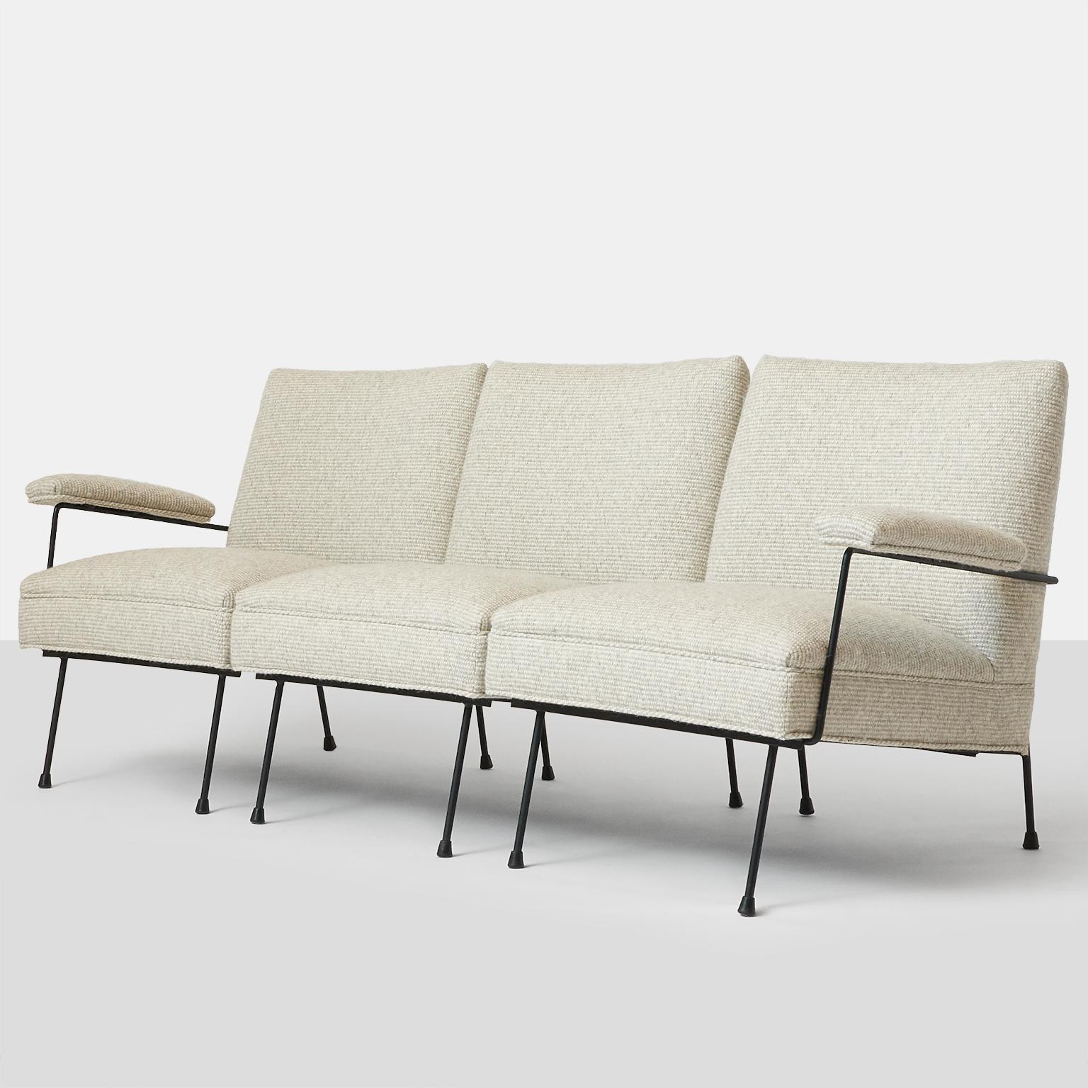 A rare three-piece sectional by Milo Baughman for Pacific Iron Products. The sectional consists of one armless chair and two-one arm chairs. Completely restored in a pebble colored Sandra Jordan Alpaca.
