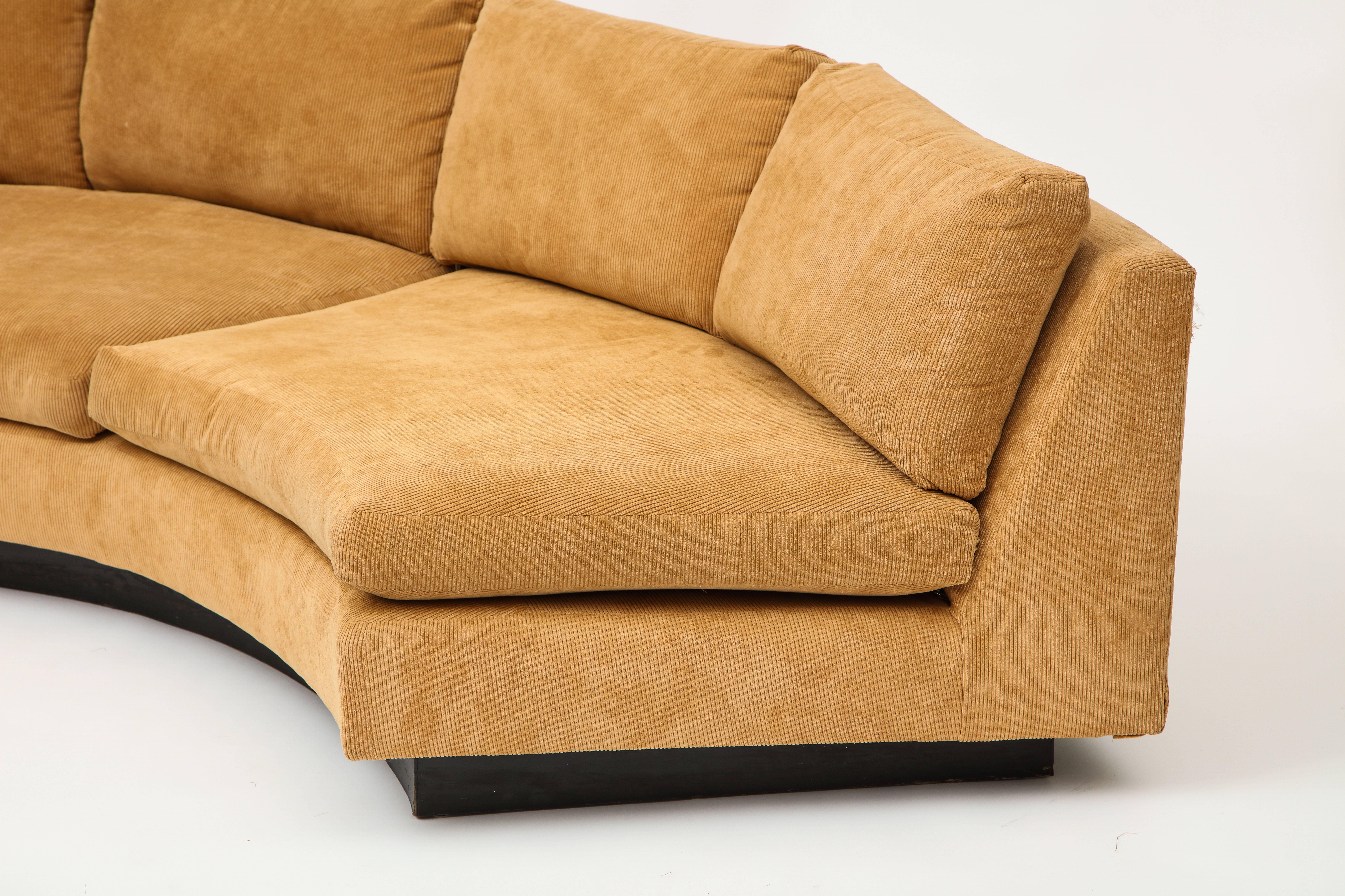 Milo Baughman semi circular two-piece sofa caramel corduroy upholstery, 1980s

Awesome sofa set. Two parts that can either be put together to create a semi circle, or put opposite one another to create a cohesive area.
Beautiful corduroy