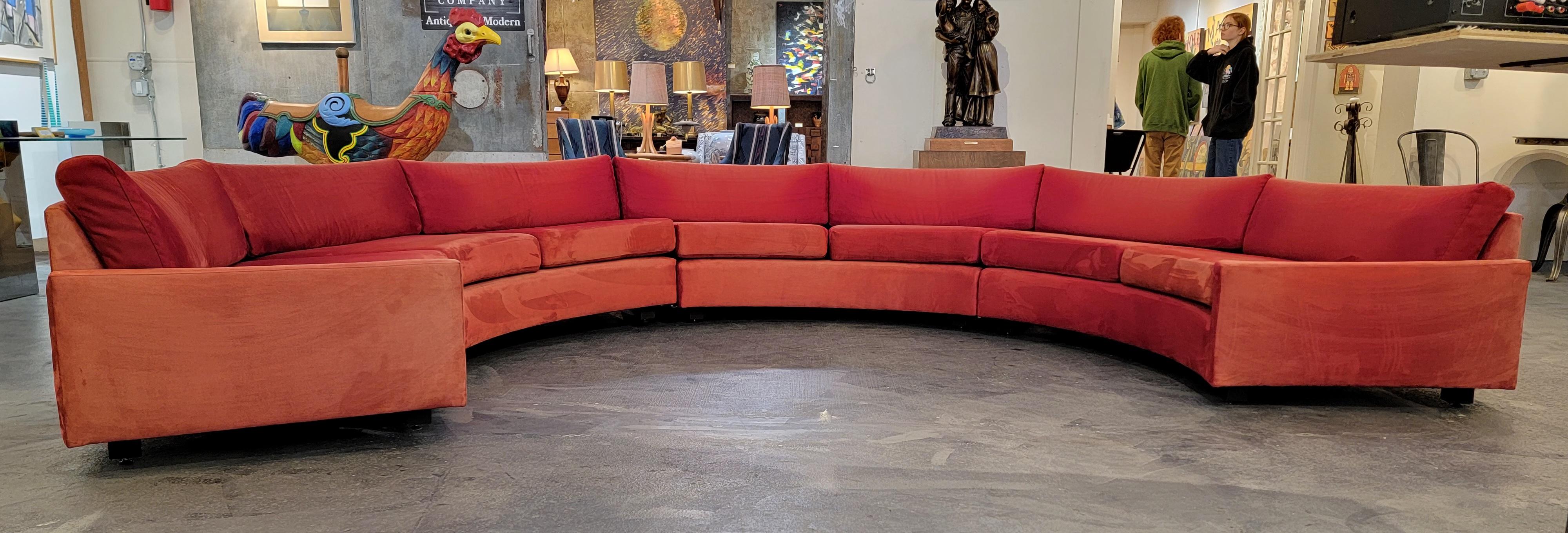 Exceptional circular sectional sofa designed by Milo Baughman for Thayer Coggin, circa 1970s. A room defining piece with amazing presence. Past re-upholstery in a velvet fabric showing minor imperfections and fade to fabric. All cushions soft and