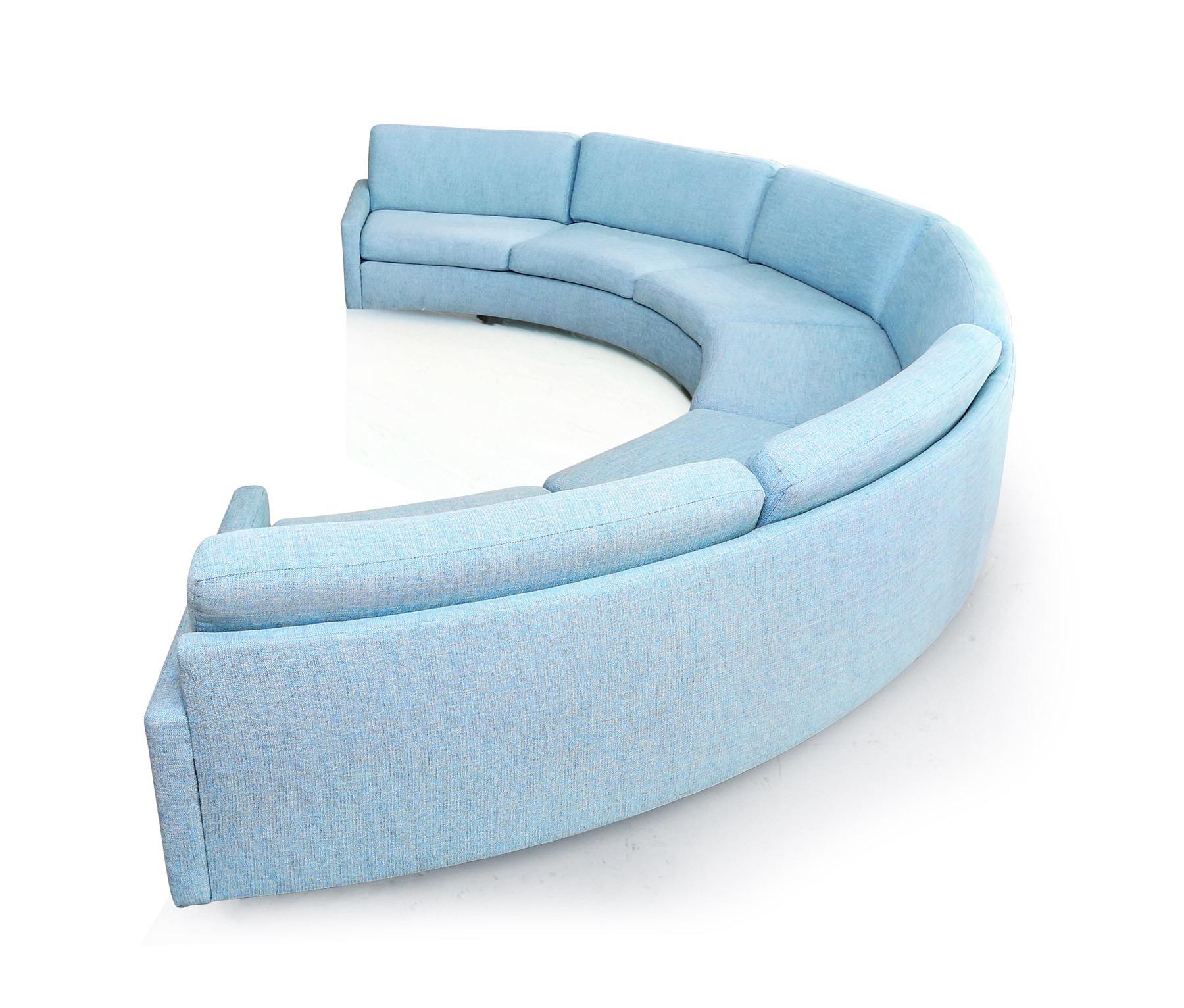 There can hardly be a more emblematic mod sofa than the Milo Baughman semi-circular sectional sofa, circa 1970s. The most well known and admired of all circular sofas, it instantly creates an intimate conversation pit in any setting, be it a