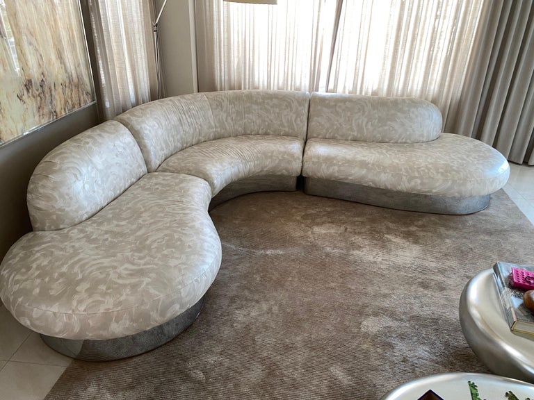Milo Baughman Serpintine sectional sofa for Thayer Coggin. Upholstery sits up on a Chrome Curving Base. Three sections which allows you to move this beast! Very Dramatic Comfy Sofa! Rare opportunity to make this sofa over in any way you would like!