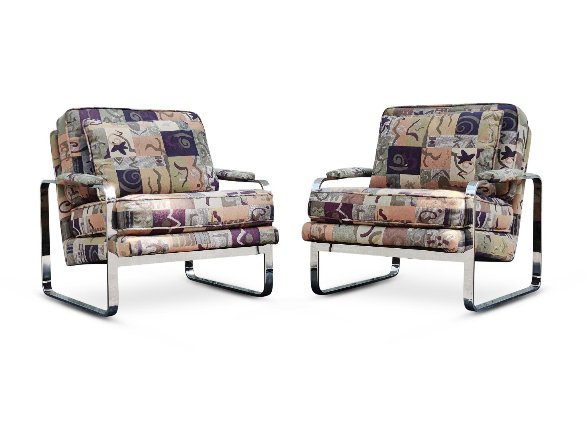 A handsome pair of low and wide loungers in the iconic style of Milo Baughman, and by the quality top quality manufacturer, Bernhardt. This 1970s pair of club chairs was likely recovered in the mid 90s. The chrome frames are clean and bright. The