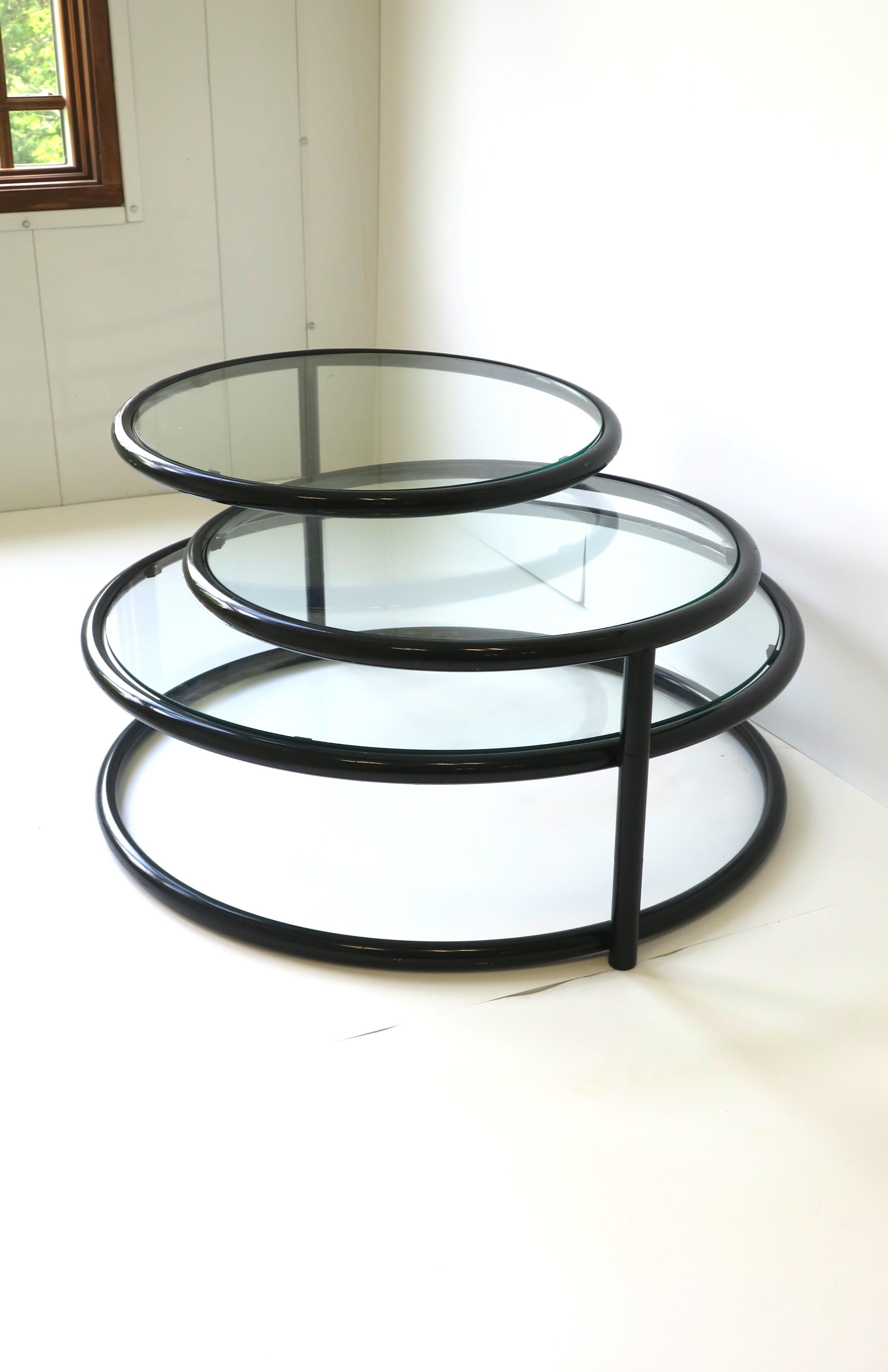 Black Tubular and Glass Swivel Cocktail Coffee Table in the Milo Baughman Style In Good Condition For Sale In New York, NY